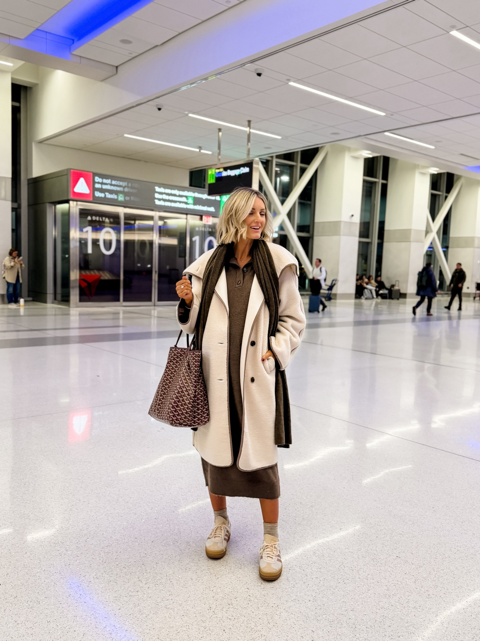 My outfit that I wore to get my hair done and then to fly to New York! This brown sweater dress is such a good fall & winter staple! Styled it with my new fleece coat & this wrap! Wearing XS in jacket & S in dress!

Loverly Grey, fall outfit, airport outfit, sweater dress, winter outfit, travel outfit, New York, maternity 

#LTKStyleTip #LTKSeasonal