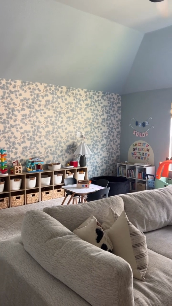 playroom transformation ✨ added this cubby storage, play mat, and wall decor and it completely changed the space — so much more organized and easier to keep tidy! linking our exact setup plus a few favorite bins for simple, kid-friendly storage

Wallpaper = Pine, Misty Blue - S10328 from Scandinavian Wallpaper

playroom storage, cubby organizer, toy storage, kids room ideas, playroom furniture, storage bins, cube shelf, playroom makeover, organization ideas, kids storage unit, target home, target finds, playroom decor

#LTKKids #LTKFamily #LTKHome