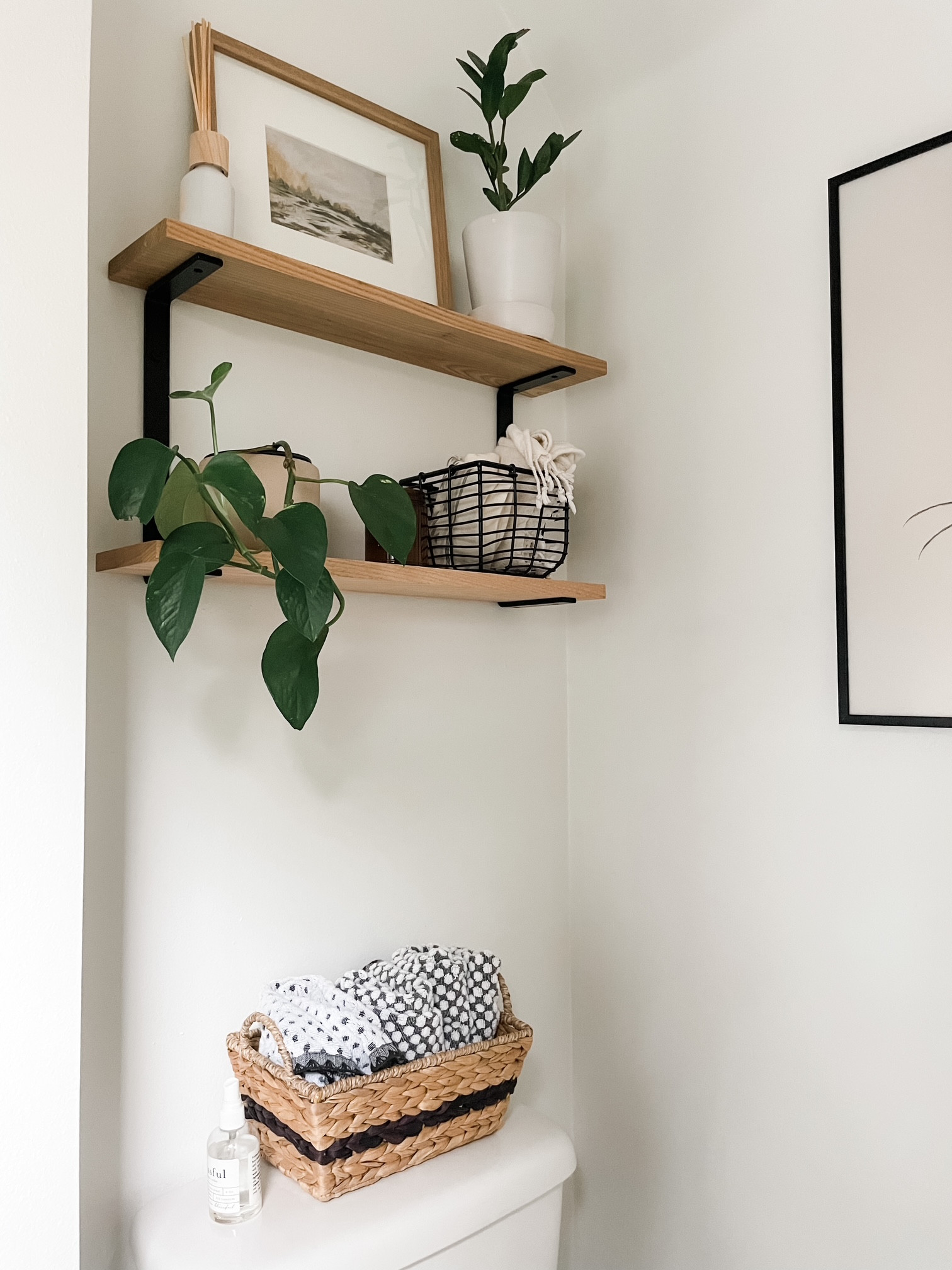Two tiered shelves with double brackets make it super easy to add storage and function - making use of  the empty space above the toilet. Super easy home update! 

#LTKHome