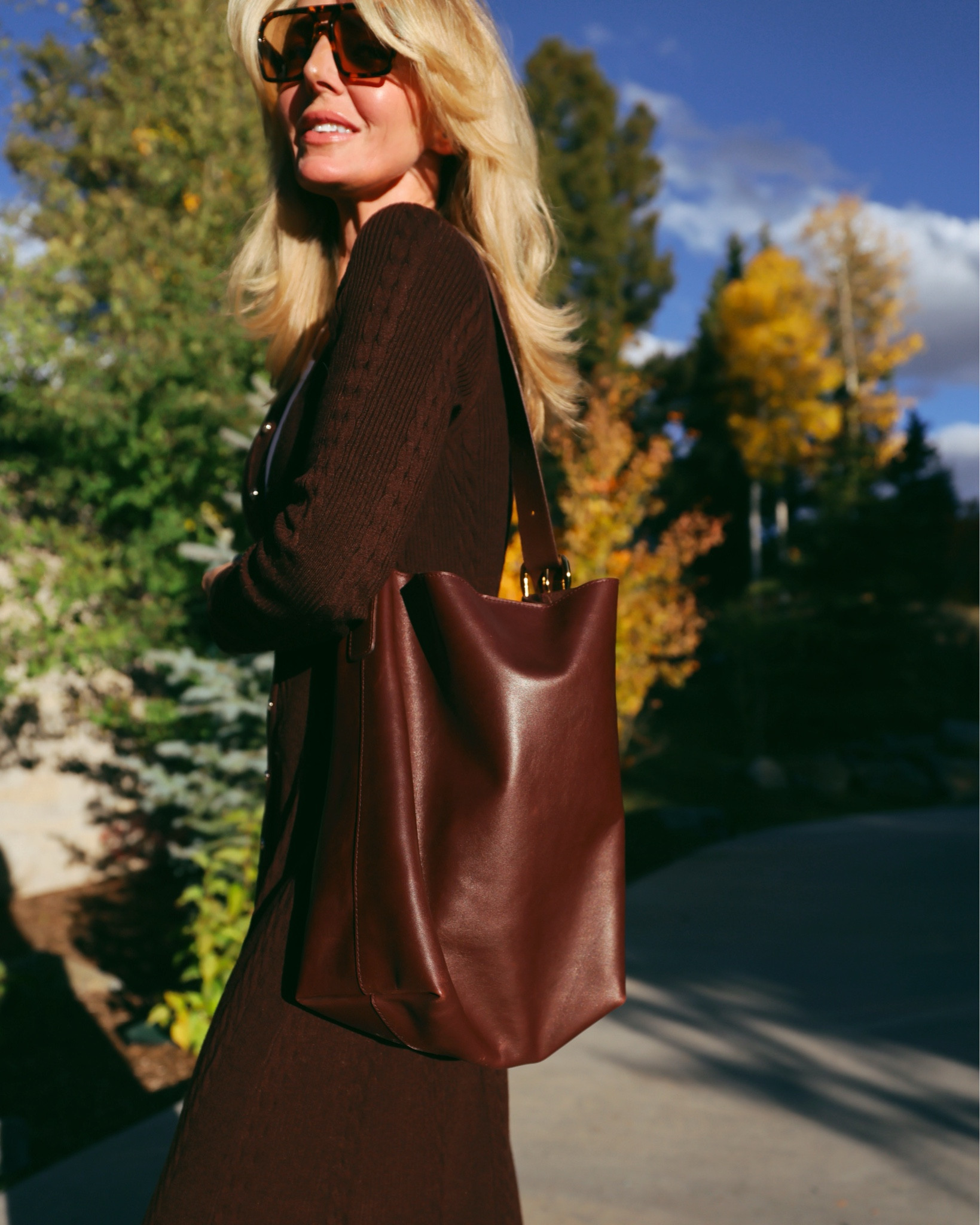 If you love the brown handbag trend, but don’t want to splurge, the Madewell Bucket Tote in Chocolate Raisin is the perfect entry point. The rich, warm shade feels elevated and seasonal, while the soft leather gives it a luxe look well beyond its price tag.

It’s roomy enough to hold all your essentials without feeling bulky, and the slim silhouette hugs close to the body—making it ideal for everyday use.

I’ve had mine for over a year, and it’s truly become my go-to grab-and-go bag. It’s especially great for travel, everyday errands, and even busy teachers who need something stylish and functional.

This is one of those bags you’ll find yourself reaching for again and again throughout fall and winter—a chic, practical way to tap into the season’s must-have trend.

#LTKStyleTip #LTKSeasonal #LTKItBag