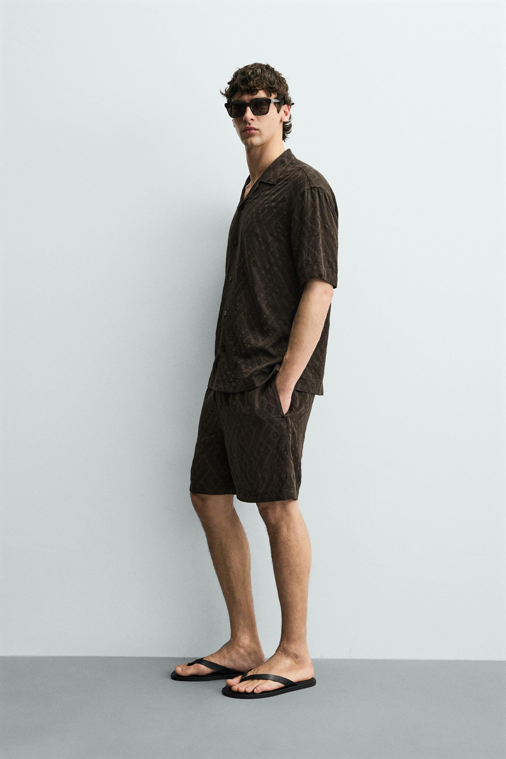 Regular fit shorts made of a fluid viscose and cotton blend fabric. Adjustable elastic drawstring... | Zara US