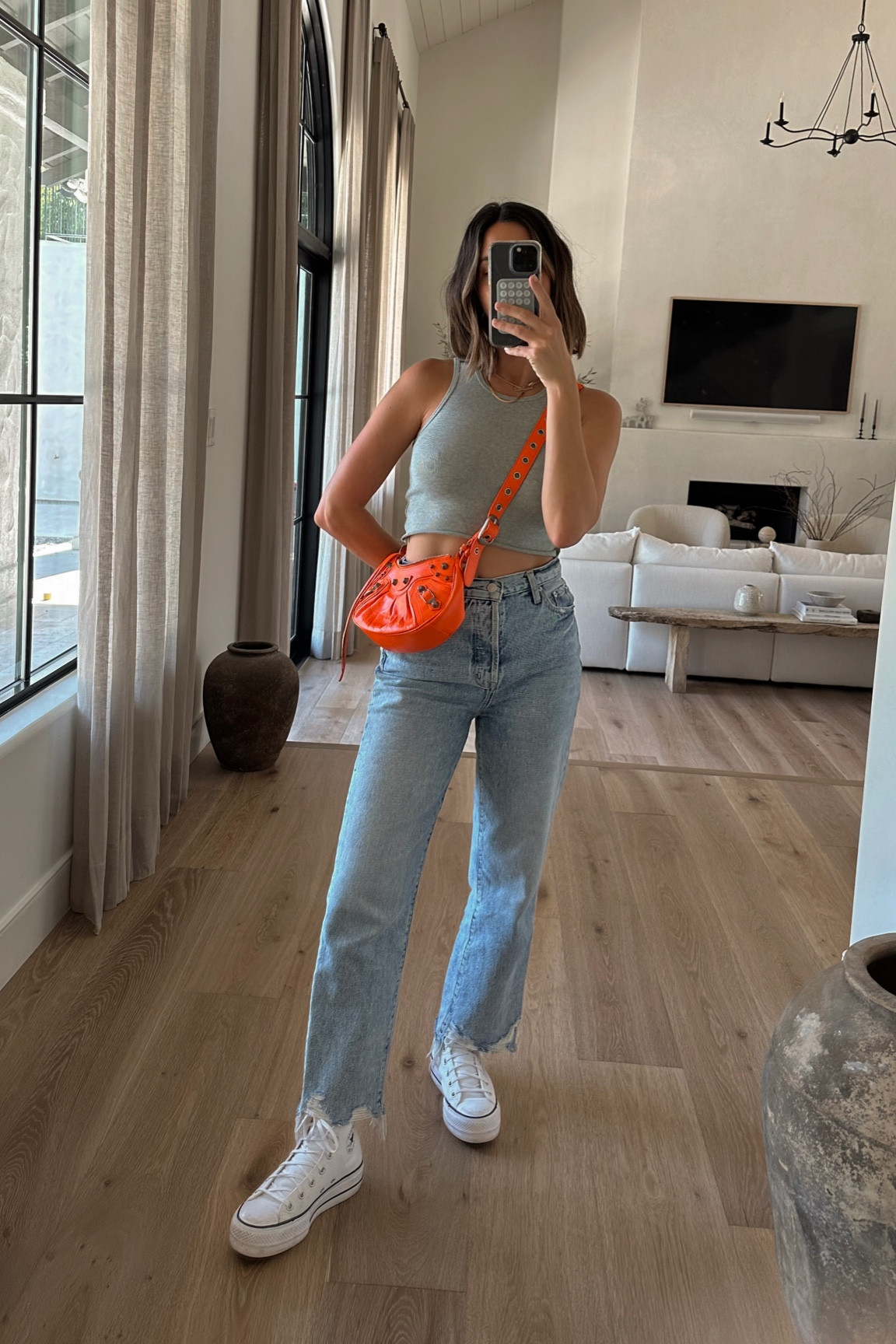 Tank - XS
Jeans - 25
Sneakers - 7