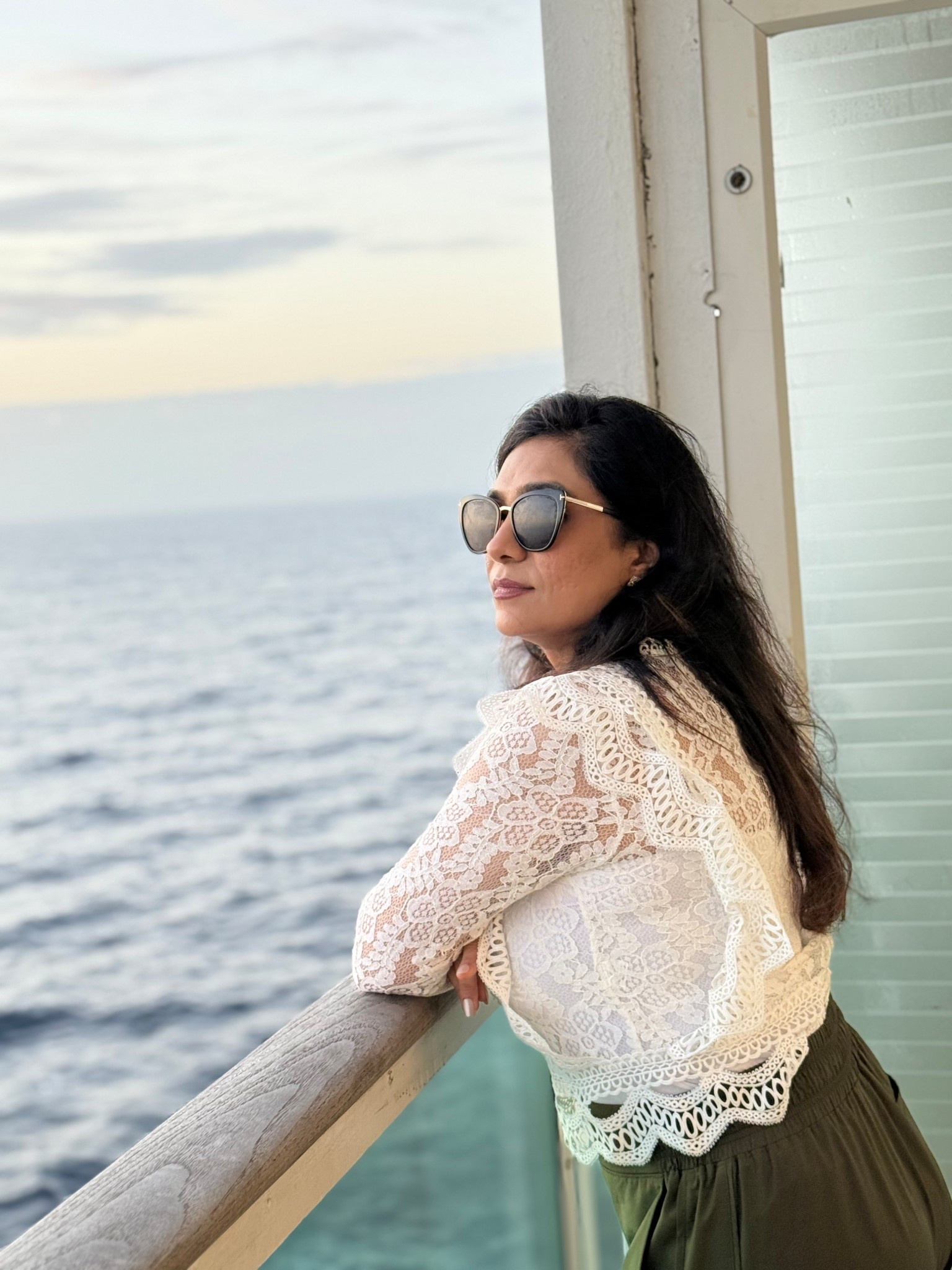 I layered a white tank top under this lace top and paired it with flowy green pants for the perfect cruise outfit  

#LTKmomlife #LTKootd #LTKgrwm