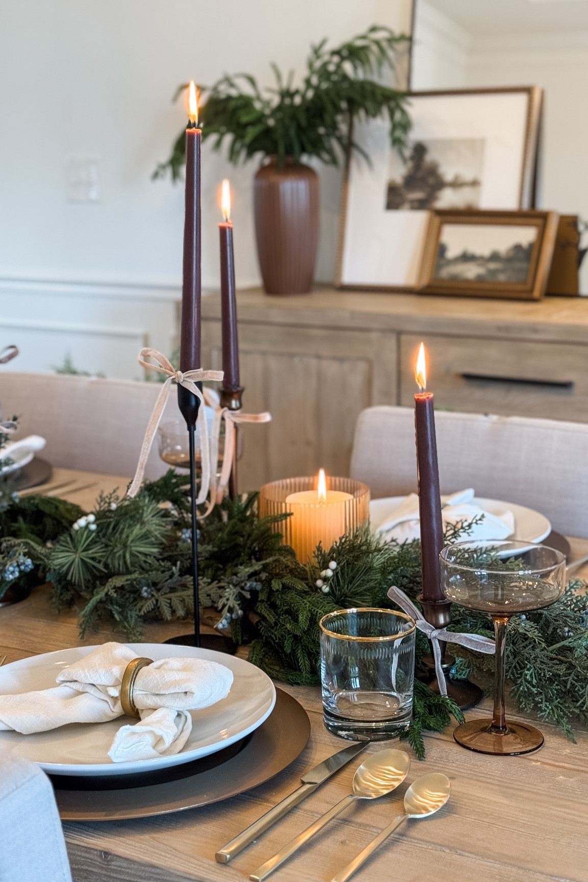 holiday tablescape 

loving bows so I folded my napkins in bows and added velvet ribbon to my candle sticks 🎀

#LTKHoliday #LTKHome #LTKSeasonal
