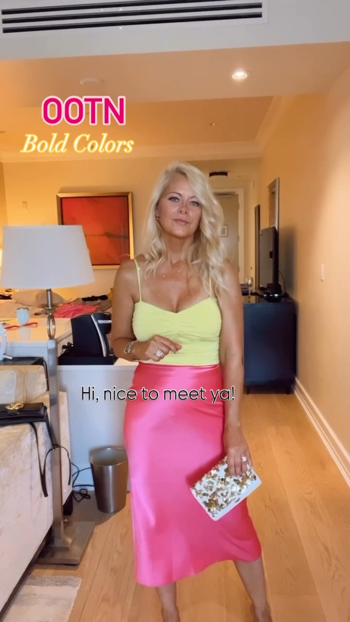 Color blocking outfit, pink silk skirt, yellow bodysuit 

#ltkfashion #ltkstyle

#LTKOver40 #LTKStyleTip #LTKVideo