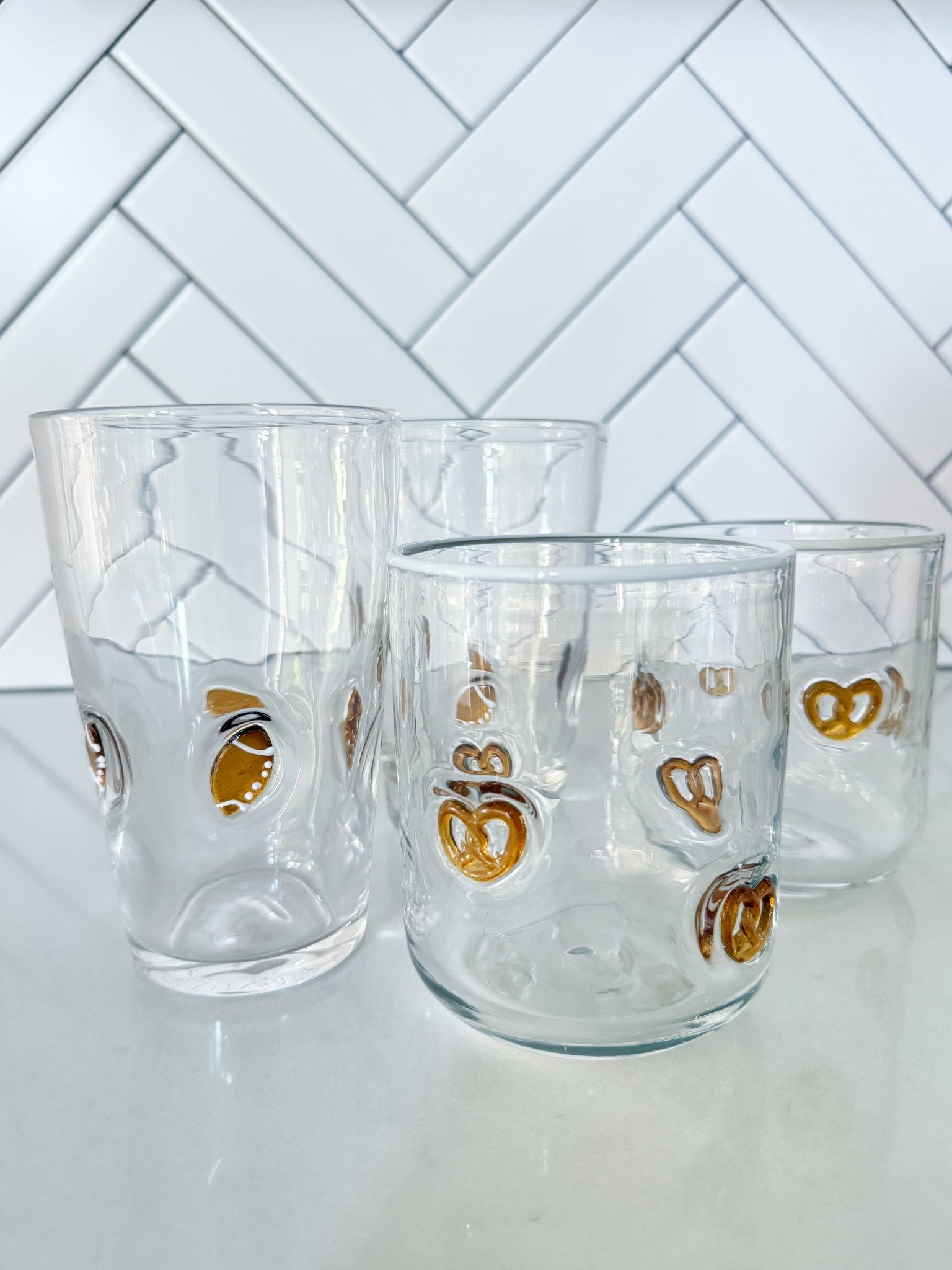These football & pretzel icon glasses instantly upgraded our game day entertaining setup, whether we’re hosting a crowd or just making drinks for two.

fall drink glasses – football party cups – gameday glassware – pretzel drinking glasses – fall kitchen finds – football hosting essentials – tailgate drinkware – cute glasses for fall – football bar cart style – autumn drinkware – seasonal glassware – unique glass set – ltk fall finds – ltk hosting essentials – football home decor

#LTKSeasonal #LTKParties #LTKHome