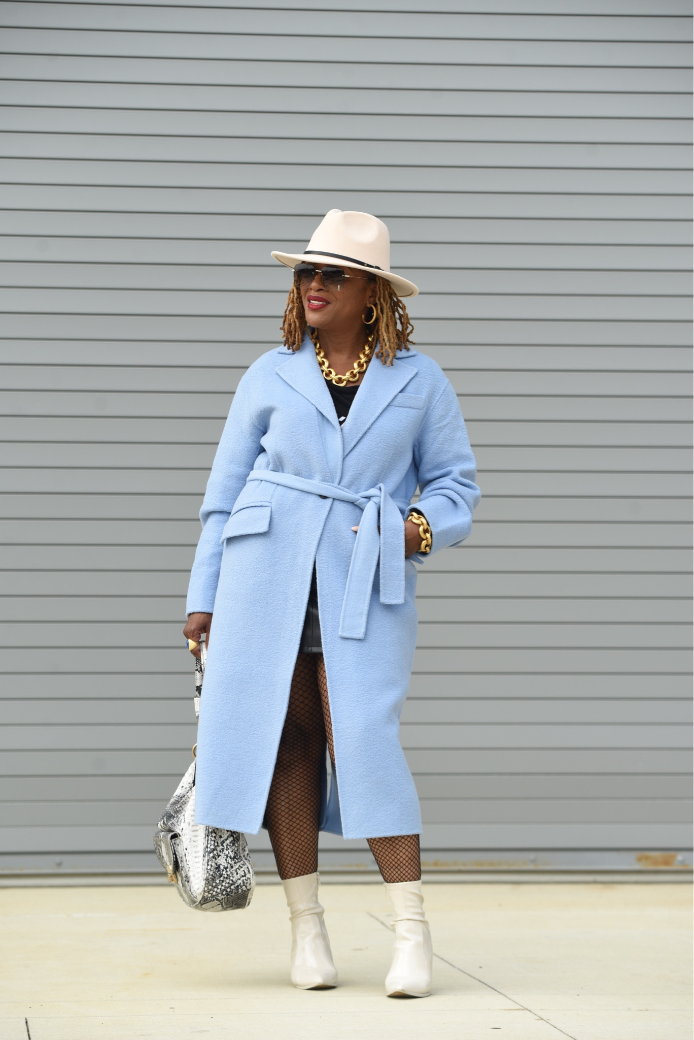 Blue fall coat, fedora hat and fishnet stockings 

#LTKStyleTip #LTKMidsize #LTKFindsUnder100