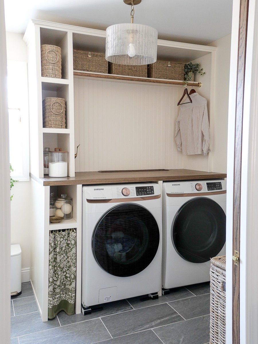 The laundry room makeover uses tons of functional and pretty storage solutions. I love these basket tones and using pretty jars for laundry detergents and powders. This light fixture has been a big hit as well! 

#LTKFindsUnder100 #LTKHome #LTKFindsUnder50