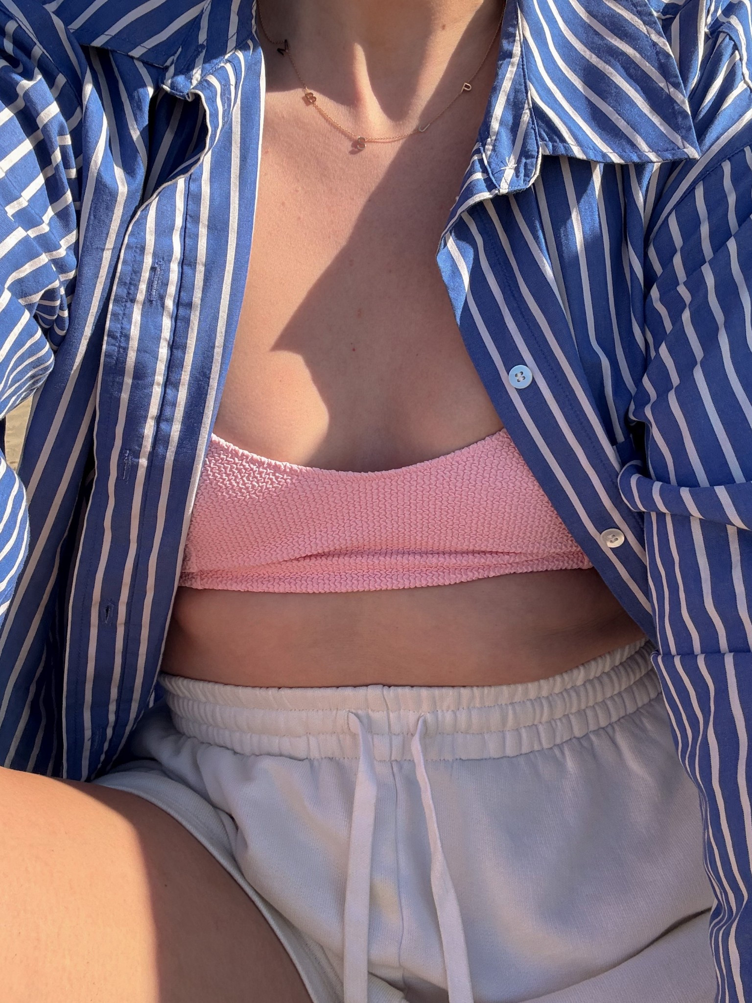  Beach outfit , holiday outfit, blue shirt, holiday style, striped shirt, cream shorts, soft shorts, terry shorts, jogger shorts. Pink bikini, swimwear; pink swimsuit, arket bikini , pink swimwear 

#LTKswimwear #LTKsummer #LTKAroundTheWorld