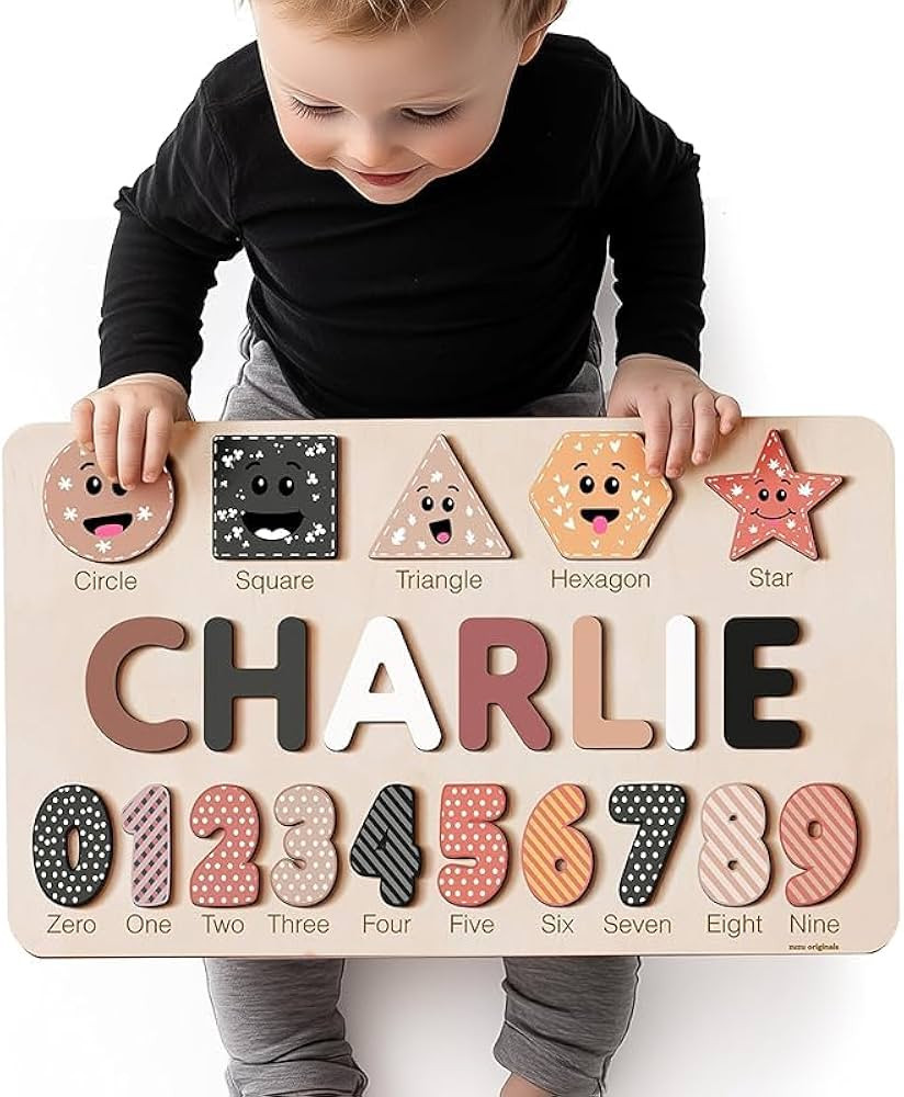 | Personalized Name Puzzle Set | Includes Wooden Puzzle, Optional Engraved Message, Stand & Premi... | Amazon (US)