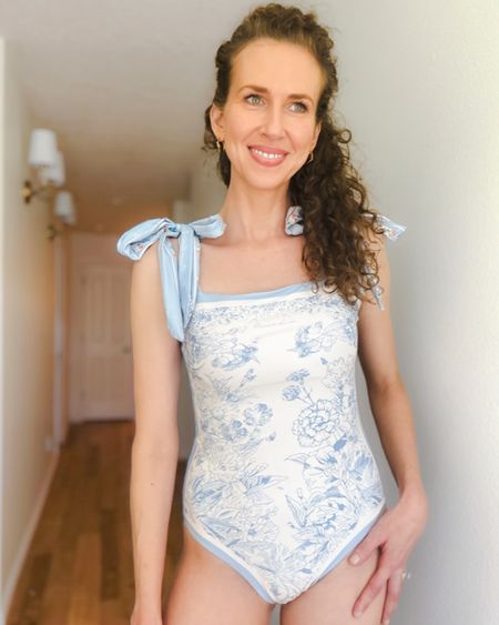 Found the sweetest one piece swimsuit on Amazon! Light blue and white with tie straps, this feminine swimsuit is also reversible. 

Currently priced under $40. It does run a little small. I’m wearing a size medium. 

#summer #swimwear #onepiece #swimsuit

#LTKSeasonal #LTKswim #LTKunder50