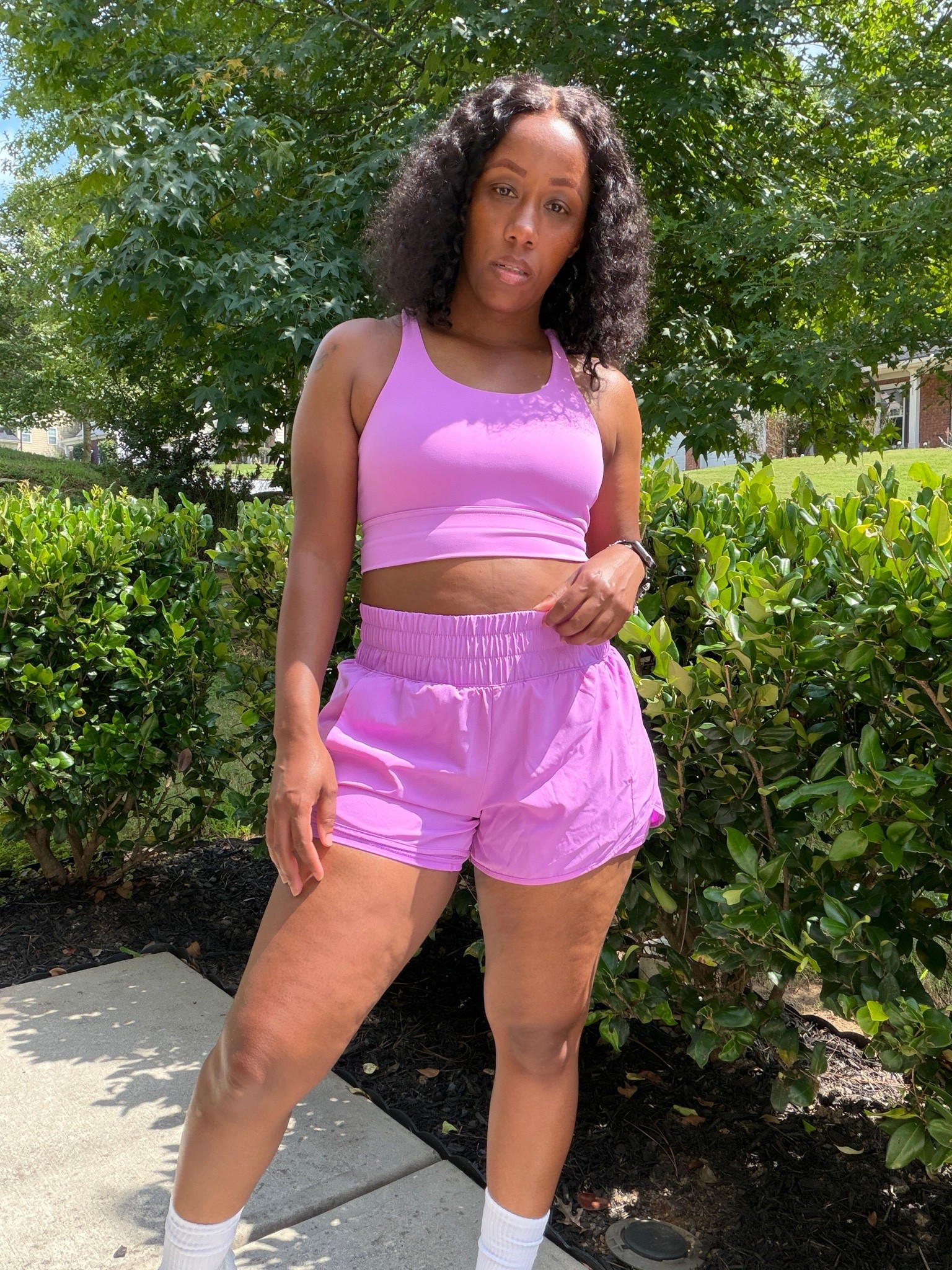 I’m wearing a pink sports bra and matching pink running shorts with white socks and sneakers for a summer walking outfit.

#LTKActive #LTKOver40 #LTKootd