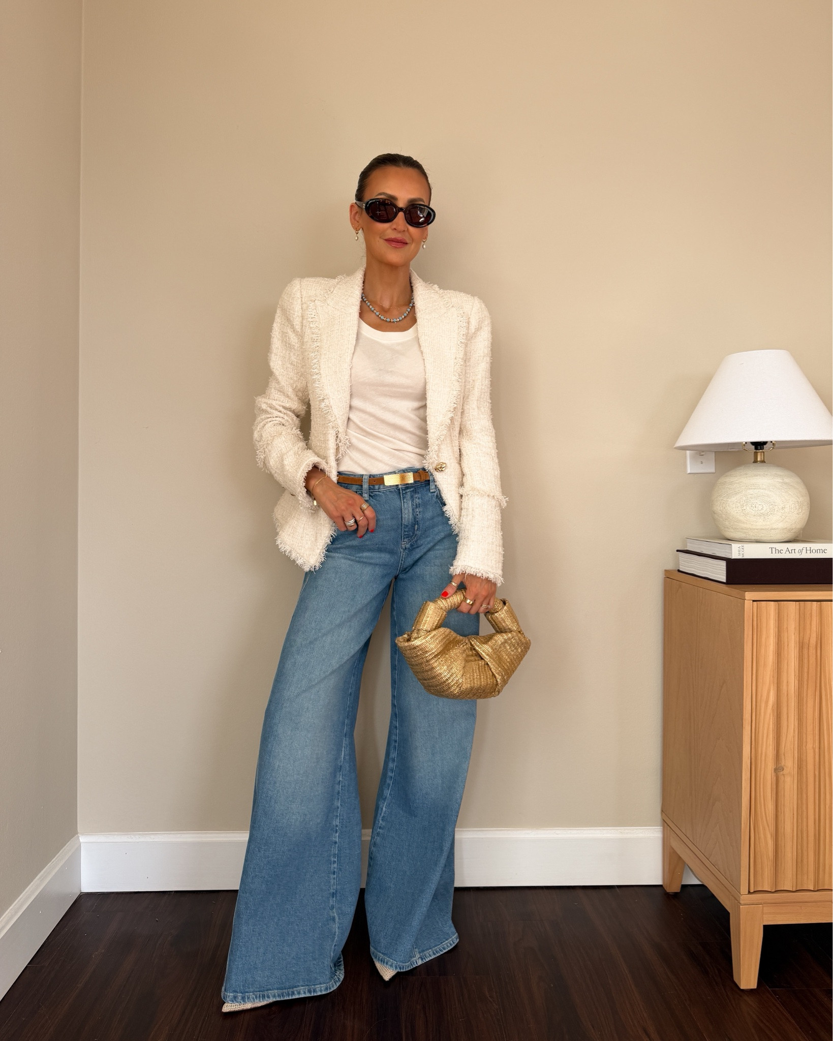 Full outfit on sale! This tweed jacket is a DREAM! Debuted in the spring ‘25 NYFW and featured a cinched waist with gold textured buttons and exaggerated shoulder pads, it’s like Chanel and balmain had a baby! The vintage tee is super soft as well as tags jeans, both fit tts

#LTKootd #LTKSeasonal #LTKSaleAlert