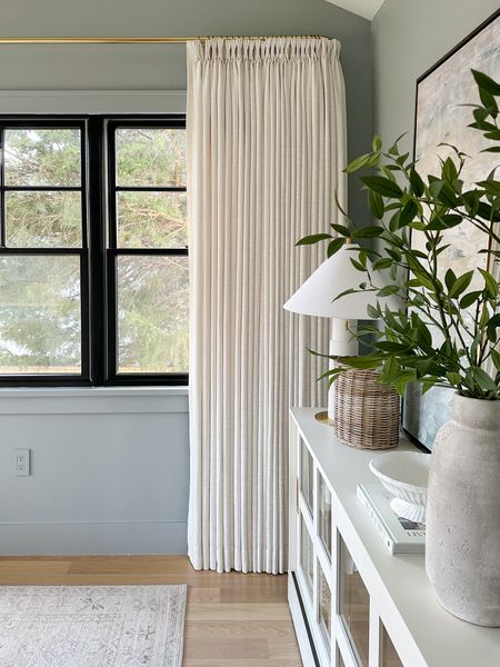 Curtain details:

Fabric: Liz Linen
Color: Ivory White 
Hanging Header Style: Triple Pleat
Single Panel Width: 150” wide
Single Panel Length (Height) in Inch: 90” long
Lining Type:Room Darkening, Shading Rate 70%-85%
Body Memory Shaped: Yes
Number of panels: 2

Rod is a French return style rod from Walmart (it sells out quickly) but I am also linking similar brass rods to achieve the same look.




Twopages curtains, drapes, custom curtains, fold curtain rod, French return curtain rod. Home office design, Boothbay gray wall paint, office design, modern coastal 

#LTKsalealert #LTKstyletip #LTKhome