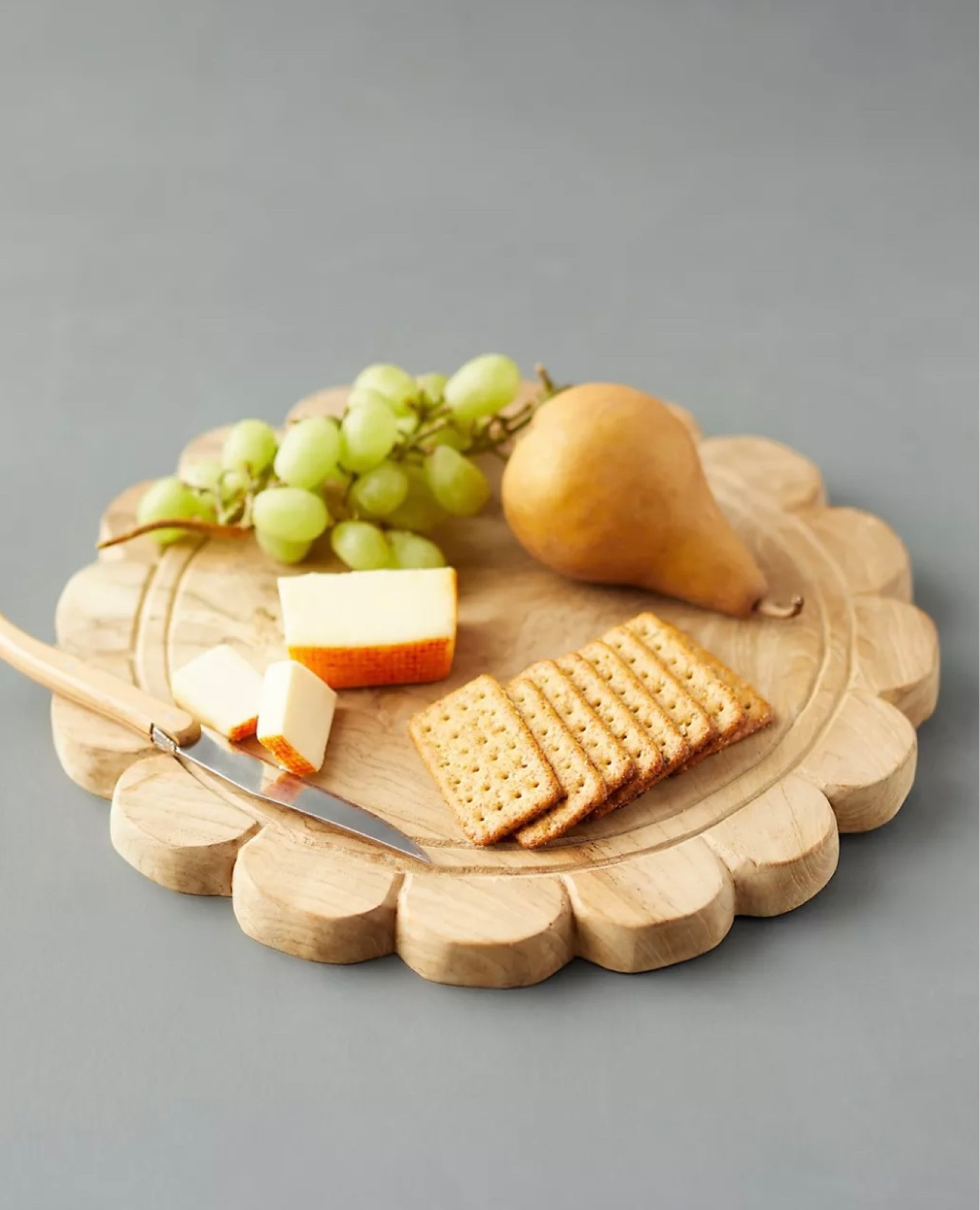 Scalloped cutting board serving board charcuterie home decor finds grandmillennial home

#LTKunder50 #LTKFind #LTKhome
