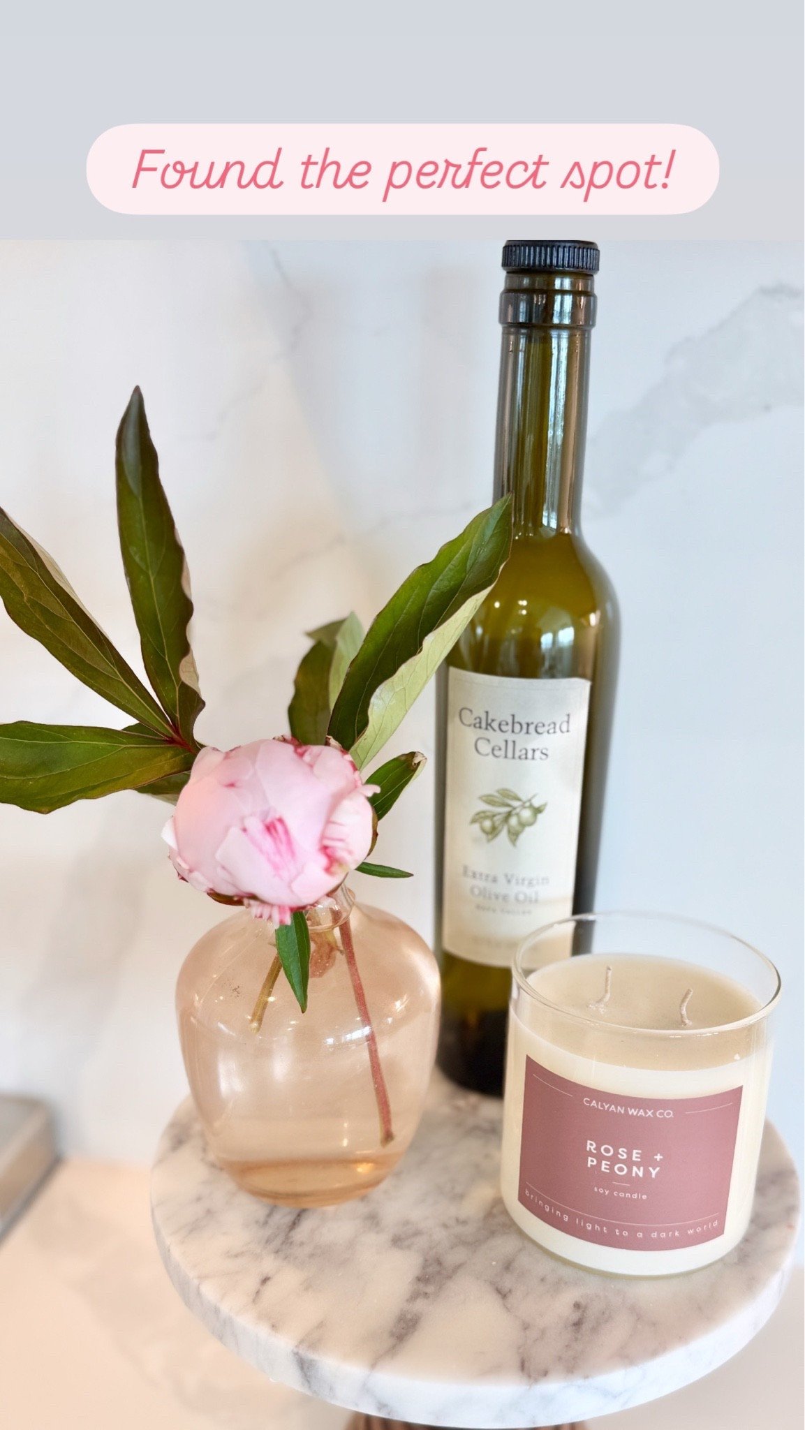 First peony bud from my garden! My favorite little spot in the kitchen, a top a marble platter alongside high-quality vineyard olive oil and my very favorite peony + rose candle

#LTKHome #LTKdayinmylife