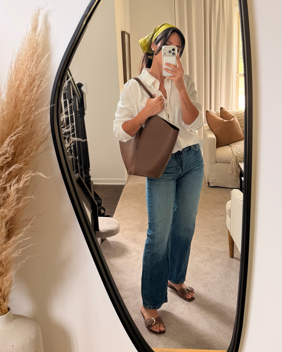Proof that the little details make the outfit. A classic white button-down, my H&M jeans, Zara tote, and the cutest hair scarf from Amazon.

Simple, effortless, and a little European-inspired. Linking everything I can find and similar pieces! 🤎