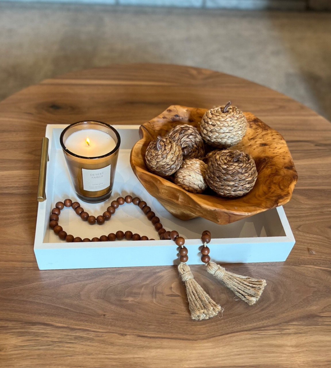 Coffee table 
Fall decor 
Candle 
Faux pumpkins 

#LTKhome #LTKstyletip #LTKSeasonal