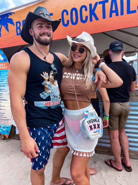 Amazon Country festival outfit 🤠
🤎 cowgirl crop tee
🤎 pink bikini
🤎 white skirt coverup
🤎 tequila purse
🤎 white straw cowgirl hat
🤎 sandals
🤎 raybans 

#LTKtravel #LTKstyletip #LTKswim