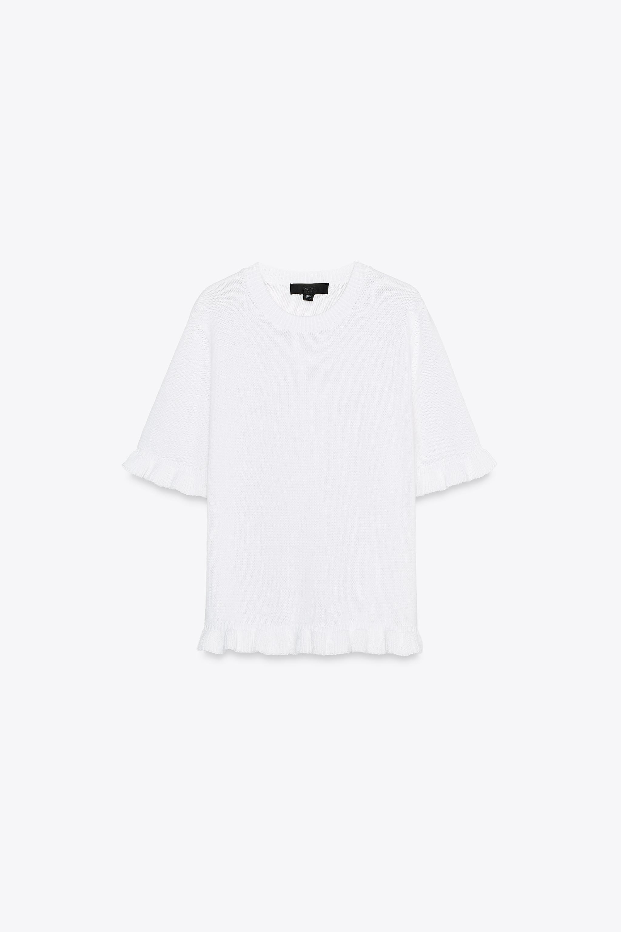 Plain knit top with round neck and short sleeves. Ruffled trim detail. | Zara US
