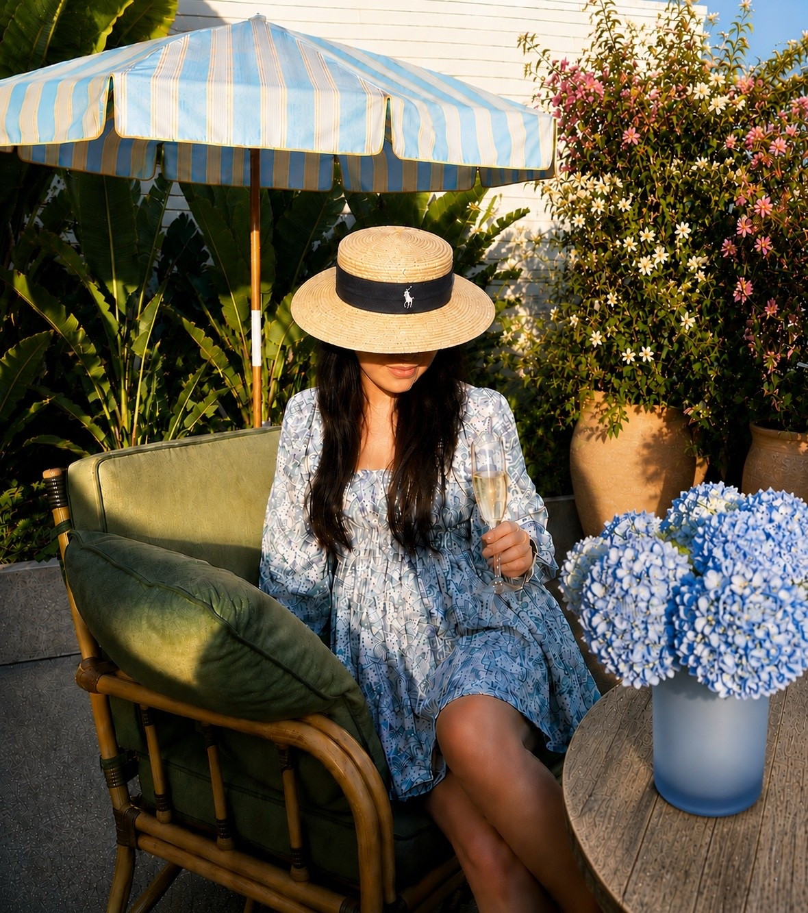 Resort lounge mood. 💙

A blue floral dress, timeless resort stripes, and a quiet afternoon under a striped patio umbrella. Just a glass of champagne, warm sunshine, and the perfect excuse to slow down.

The Fourth of July sale is going strong, so if you've been eyeing your favorite summer fashion or outdoor finds, now's the time to take action before they're gone.

Everything is linked in my LTK.

#LTKStyle #LTKSale #FourthOfJulySale #ResortStyle #BlueDress #PatioUmbrella #OutdoorLiving #ResortLiving #SummerStyle

#LTKdayinmylife #LTKHome #LTKSaleAlert