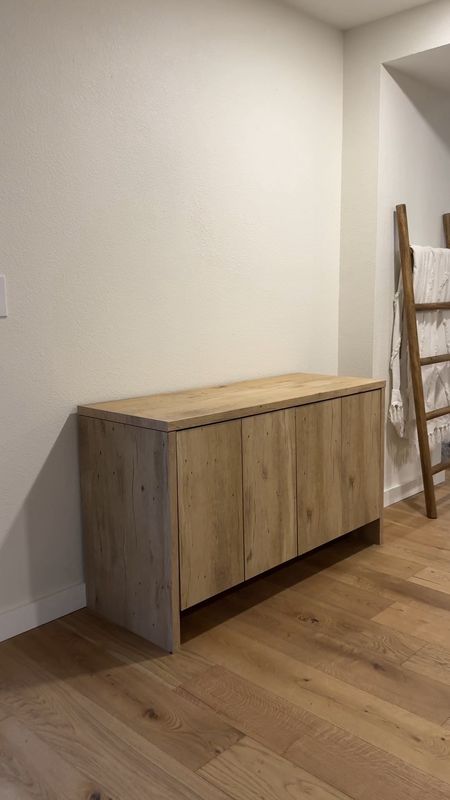 The BEST home find!! This beautiful oak sideboard is $299 & has outlet holes🙌🏽

#LTKhome #LTKSeasonal #LTKVideo