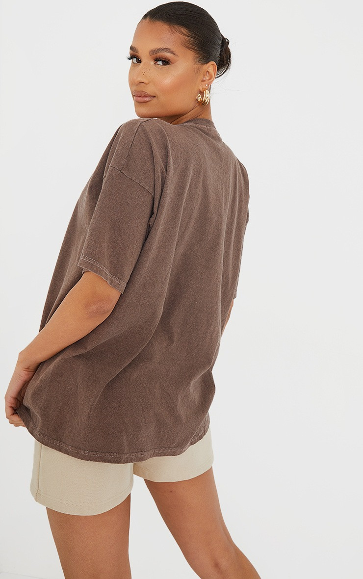 Chocolate Stay Optimistic Small Print Graphic Washed Short Sleeve T Shirt | PrettyLittleThing US