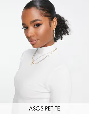 ASOS DESIGN Petite turtle neck crop top in white | ASOS (Global)