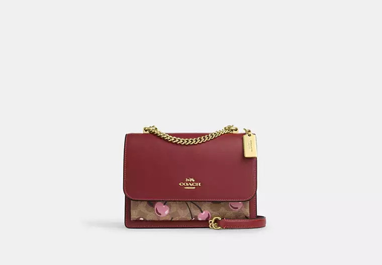 Klare Crossbody Bag In Signature Canvas With Cherry Print | Coach Outlet US