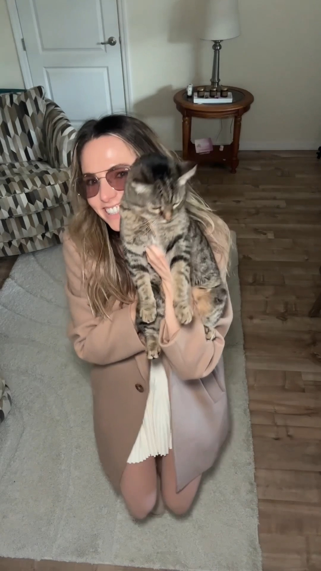 thanksgiving outfit idea 🤎 keeping it neutral, cozy, and a little bit chic. a ribbed knit tank + pleated mini skirt as the base, layered with a soft sweater, a camel coat, and chunky boots for that perfect fall vibe. comfy enough for a long day with family, cute enough for all the photos 🍂✨

wearing a size small in everything - the textures + layers make this such an easy thanksgiving look that still feels elevated.

#thanksgivingoutfit #falloutfitideas #fallstyle #neutraloutfits #cozychic #effortlessstyle #holidayoutfit #LTKholidayfashion

#LTKSeasonal #LTKootd #LTKHoliday