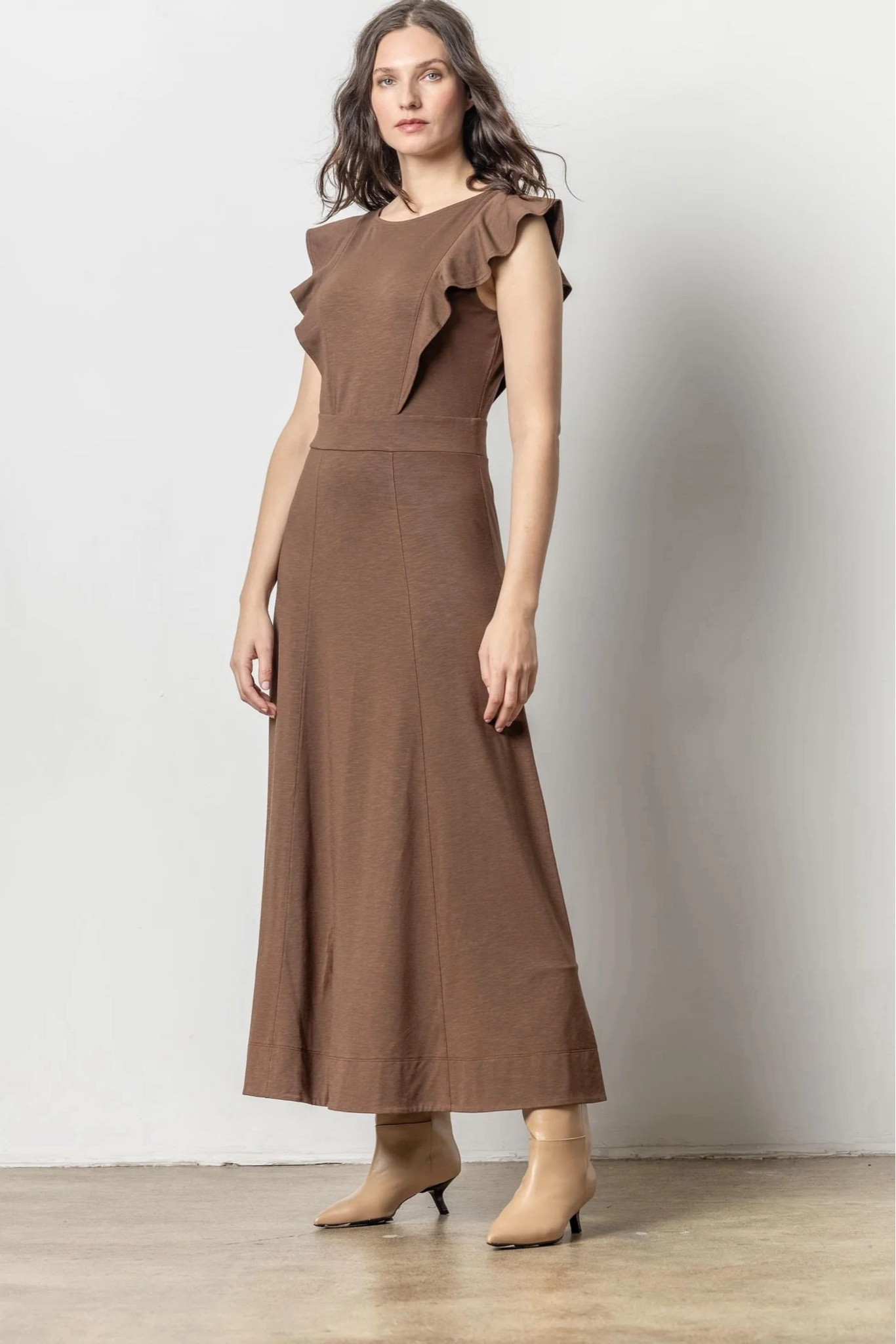 Love brown for the season! And can be worn into fall. The ruffle sleeve is perfect. True to size 

#LTKStyleTip #LTKSeasonal