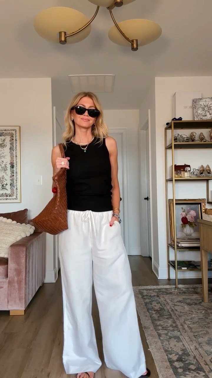 Black tank + my favorite white linen pants that are currently on sale! 
Tank: runs TTS
Pants: run TTS, wearing size small, regular

#LTKootd #LTKSeasonal #LTKSaleAlert