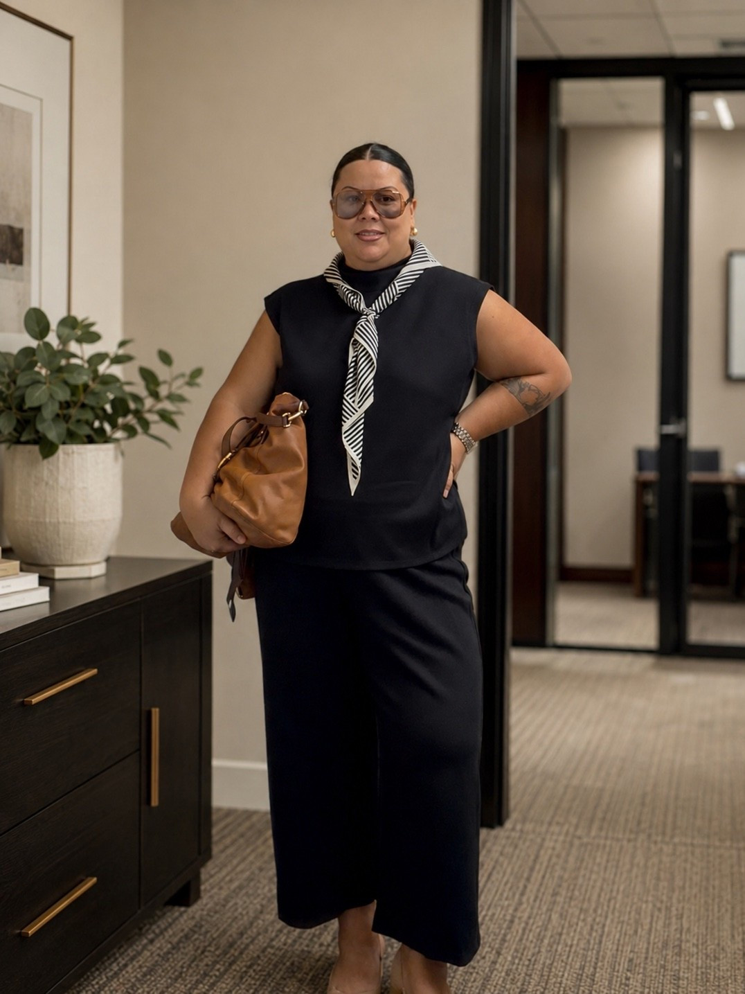 Two piece set for the win! I literally feel like I’m wearing pajamas at the office today! This high neck, sleeveless pants set comes in plus size but I’ve linked a bunch of similar matching sets in regular sizes too! 

I’m also playing around with styling silk scarves more lately too. At first I was going to tie it around my waist but decided to roll it up and use a scarf ring. Easy peezy!

#LTKootd #LTKMidsize #LTKPlusSize