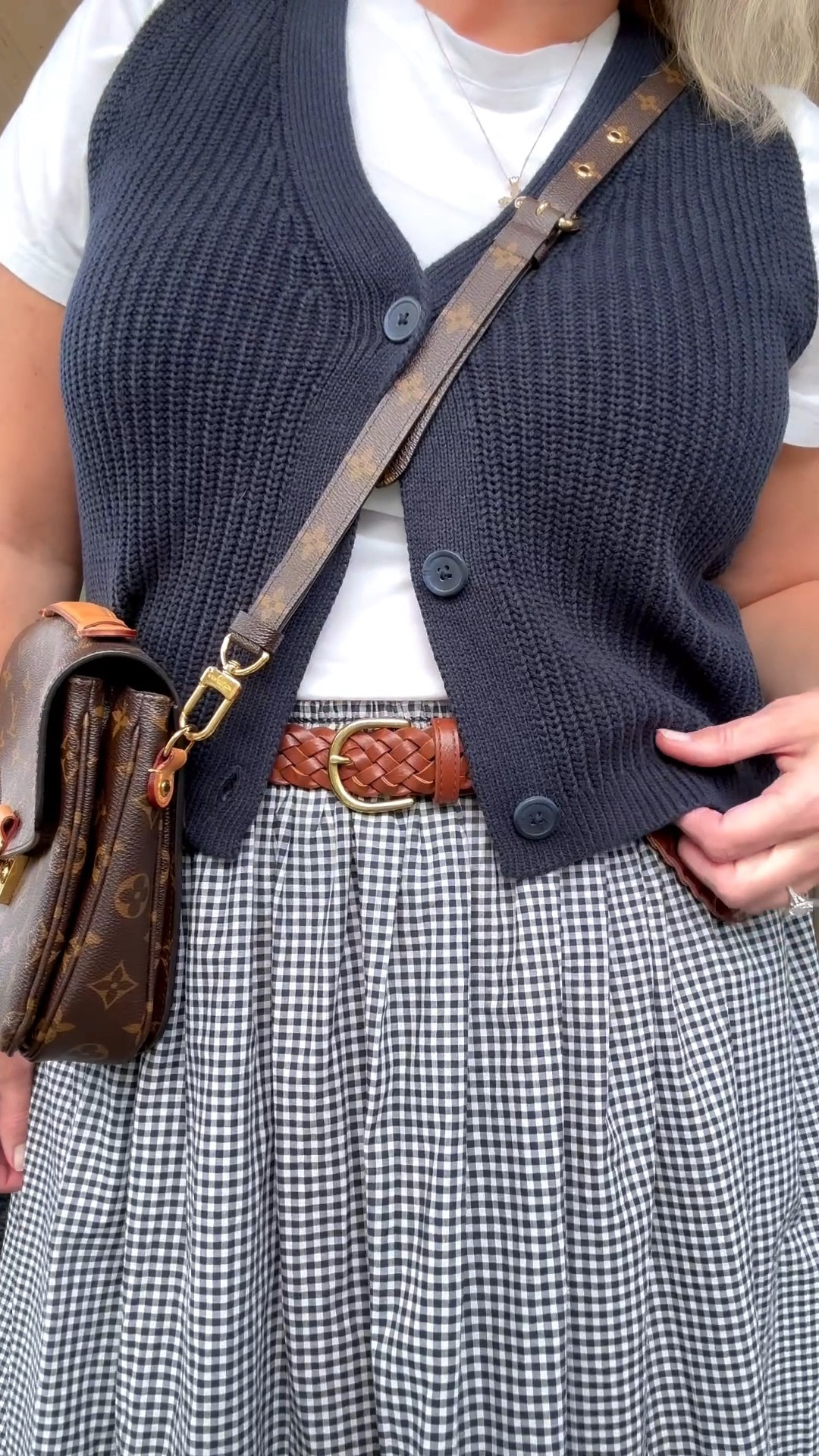 A perfect transitional outfit going from summer to fall.

Navy vest XXL 
Perfect white T-shirt XXL 
Navy check skirt, TJ MAXX size XL (linked similar)

#LTKMidsize #LTKOver40 #LTKStyleTip