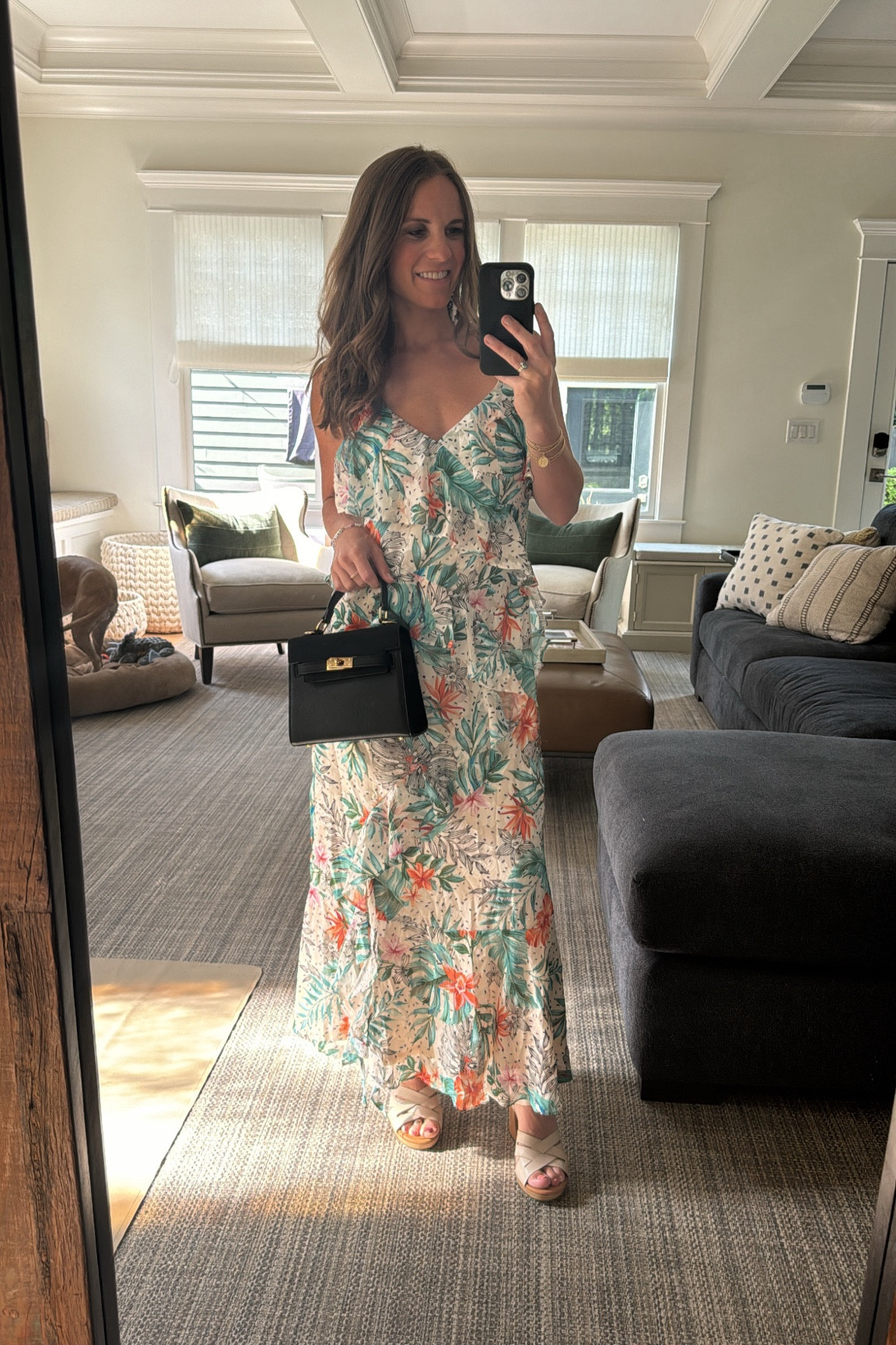 love how flowy and light this dress is! I ordered an XS. The black purse pulls out the little black dot prints in the dress; I would buy separately and use black purse for other outfits and a lighter purse with the dress next time. But still cute! 

#LTKFindsUnder100 #LTKWedding #LTKSeasonal