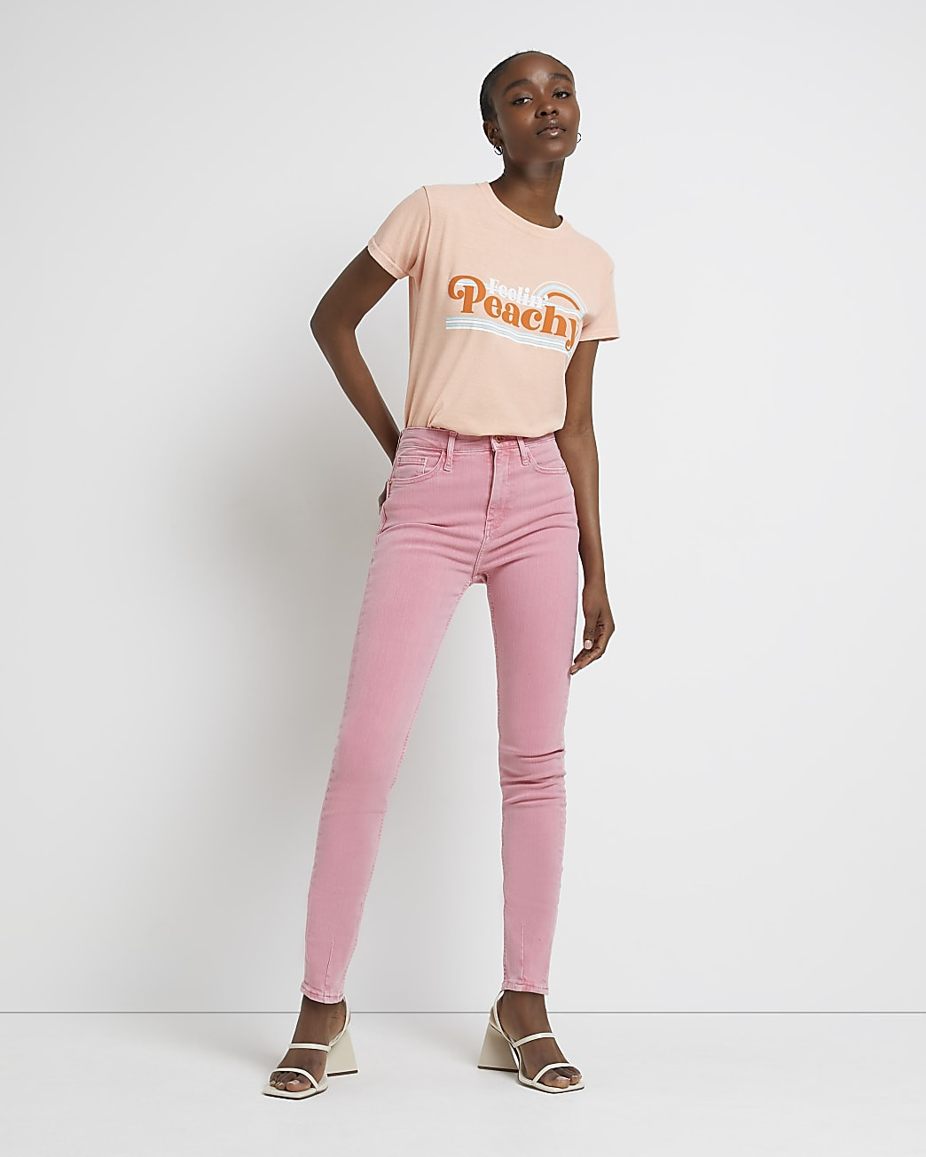 Pink high waisted bum sculpt skinny jeans | River Island (UK & IE)