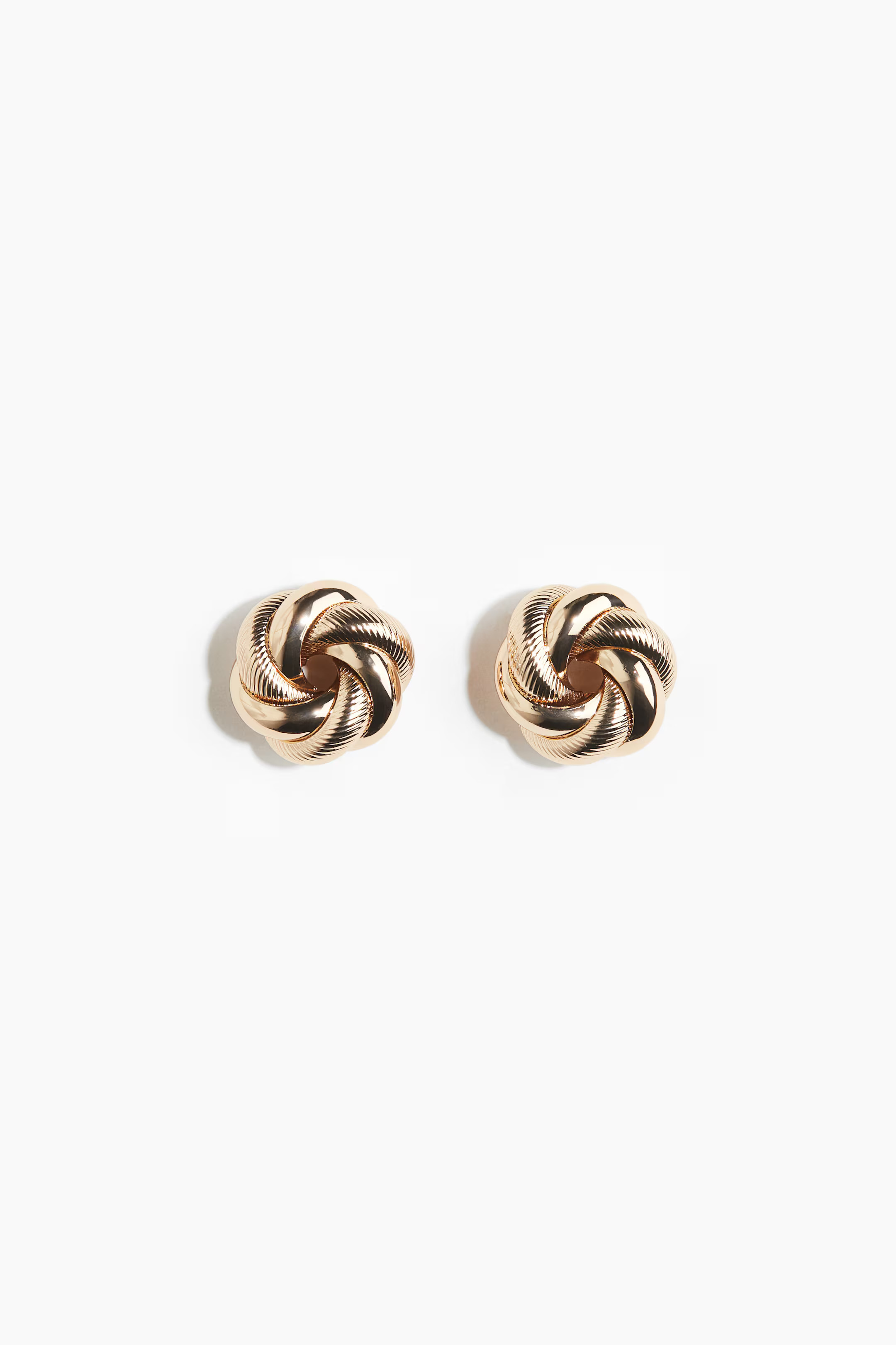 Twisted stud earrings - Gold-coloured - Ladies | H&M GB | H&M (UK, MY, IN, SG, PH, TW, HK)