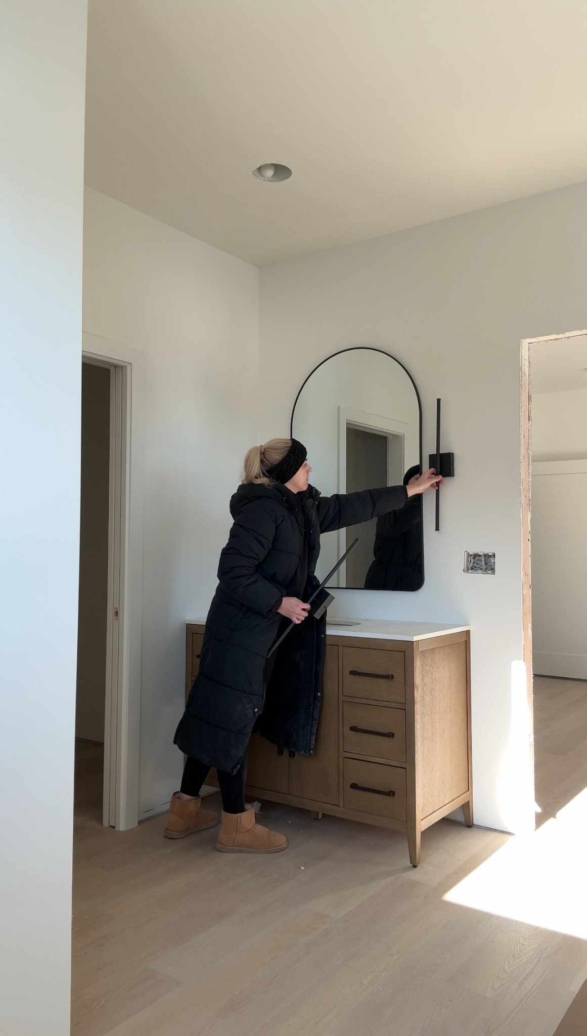 New build flooring, bathroom vanity, arched mirrors  & modern light sconces

#LTKFindsUnder50 #LTKFindsUnder100 #LTKHome