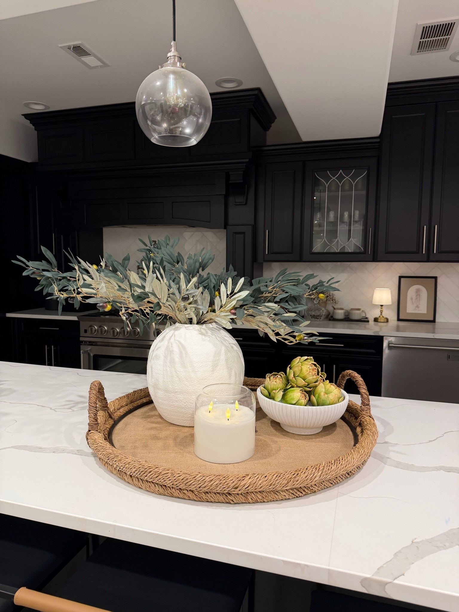 A tray + a few layered pieces instantly makes everything feel finished without adding clutter

#LTKHome
