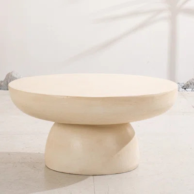 Rey Patio Round Magnesium Oxide Coffee Table | Wayfair North America