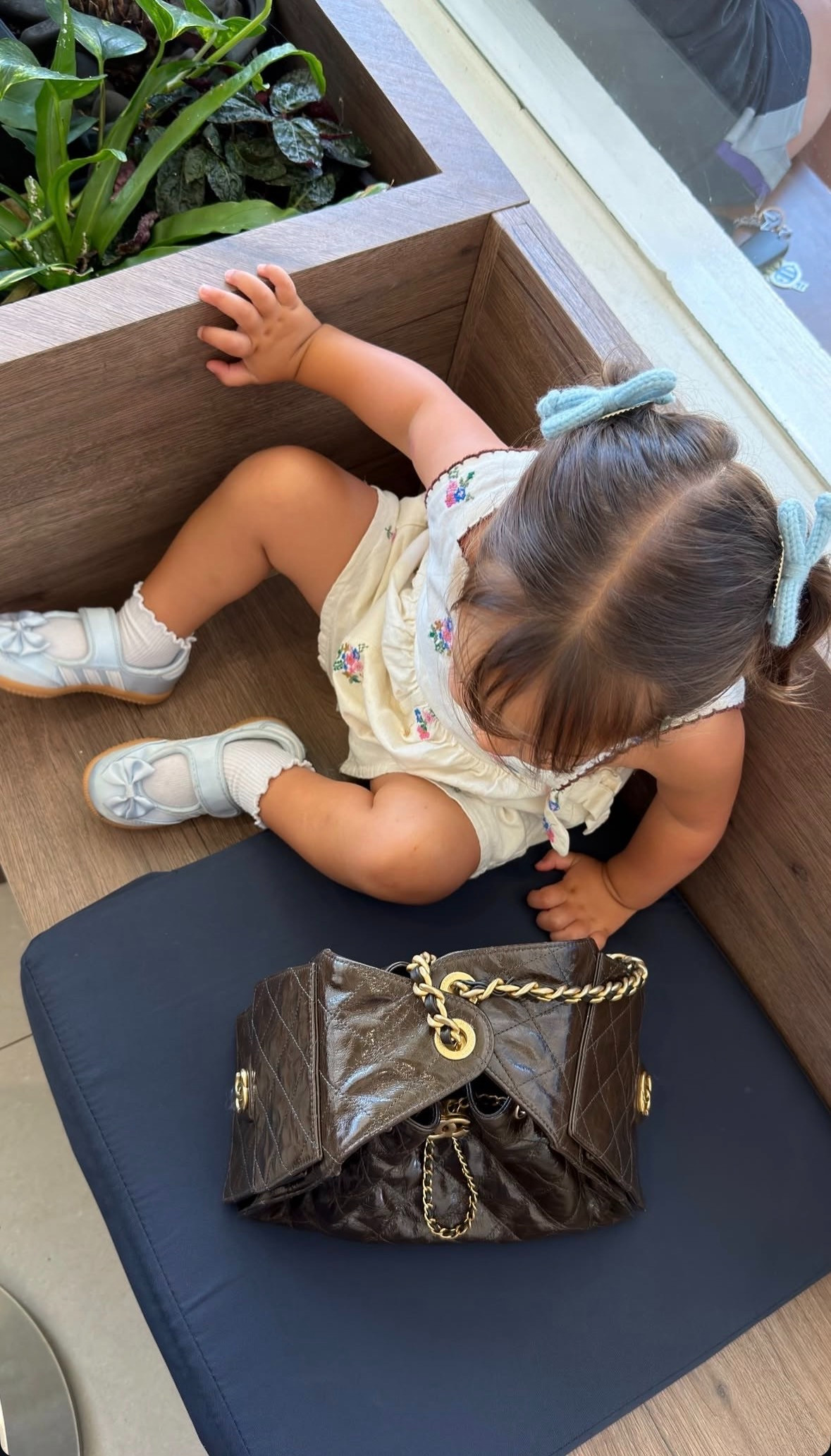 Tiny fashionista keeping an eye on the Chanel 🎀👜 

 #LTKootd #LTKmomlife #LTKKids
