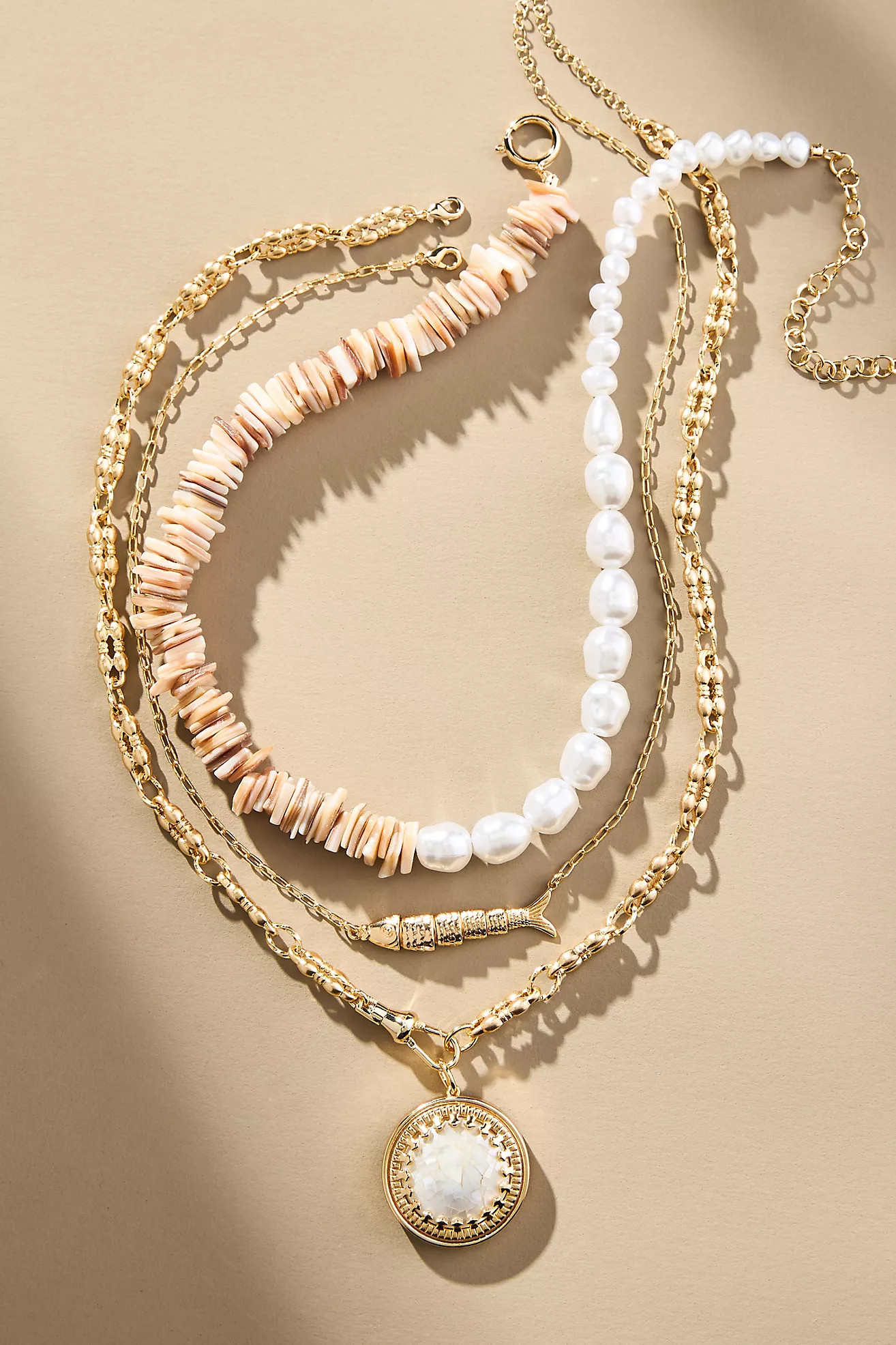 Shades of Sea Layered Necklaces: Charm Edition | Anthropologie (US)
