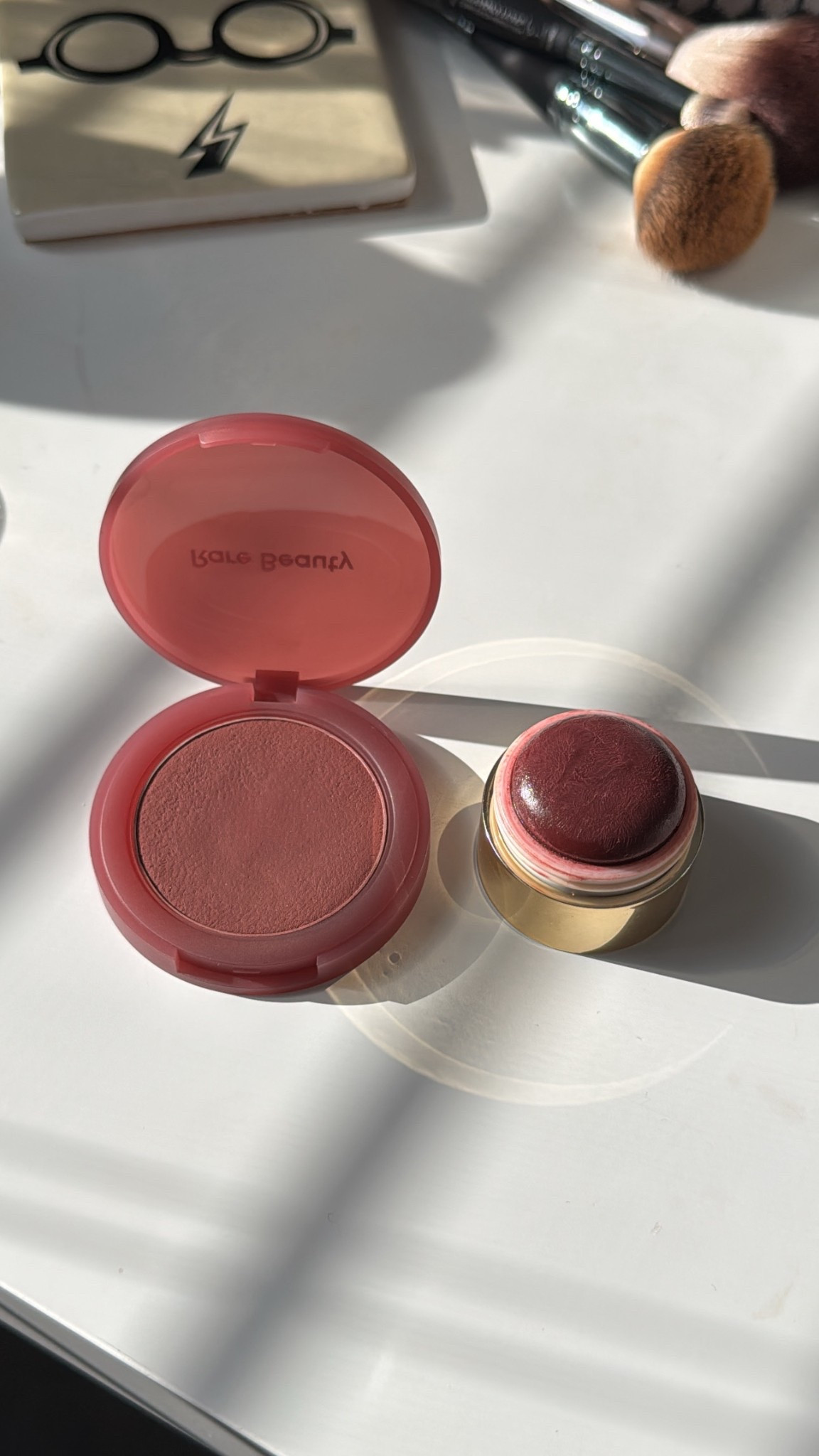 Favorite blushes! On the left: shade Truth from Rare Beauty (perfect cream/powder hybrid) On the right: cream blush from Merit, shade Apres  