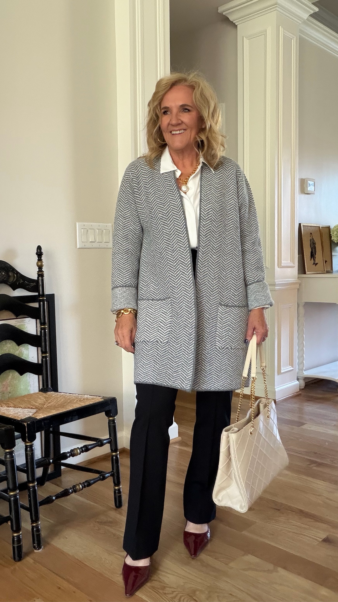 5 office outfits many of these pieces have great sales going on! 
Tweed blazer size 12 
Green trousers size small
Pinstripe ruffle blouse size small
Dress size 8 petite (right in between petite and reg)
Camel coat size 10 petite 
Spanx micro flare size large petite 
White blouse size med
Cardigan size large 
Pinstripe pants size 8 (I need a 10)
Navy blazer 10 petite 
Red Cashmere sweater size large (medium prob better) 
Sweater vest medium petite 
Striped blouse size medium 
Paige anessa jeans size 29 
JCREW boots size up 1/2 
Slingbacks size up 1/2 

#LTKWorkwear #LTKSaleAlert #LTKOver40