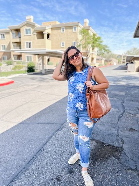 Casual spring outfit. This tank is long, more like a tunic - so I tucked it under for a shorter look. It comes in a ton of colors and patterns. Super comfy and flattering! Also, this faux leather tote is my favorite right now. I literally use it every day!

#LTKmidsize #LTKSeasonal #LTKitbag