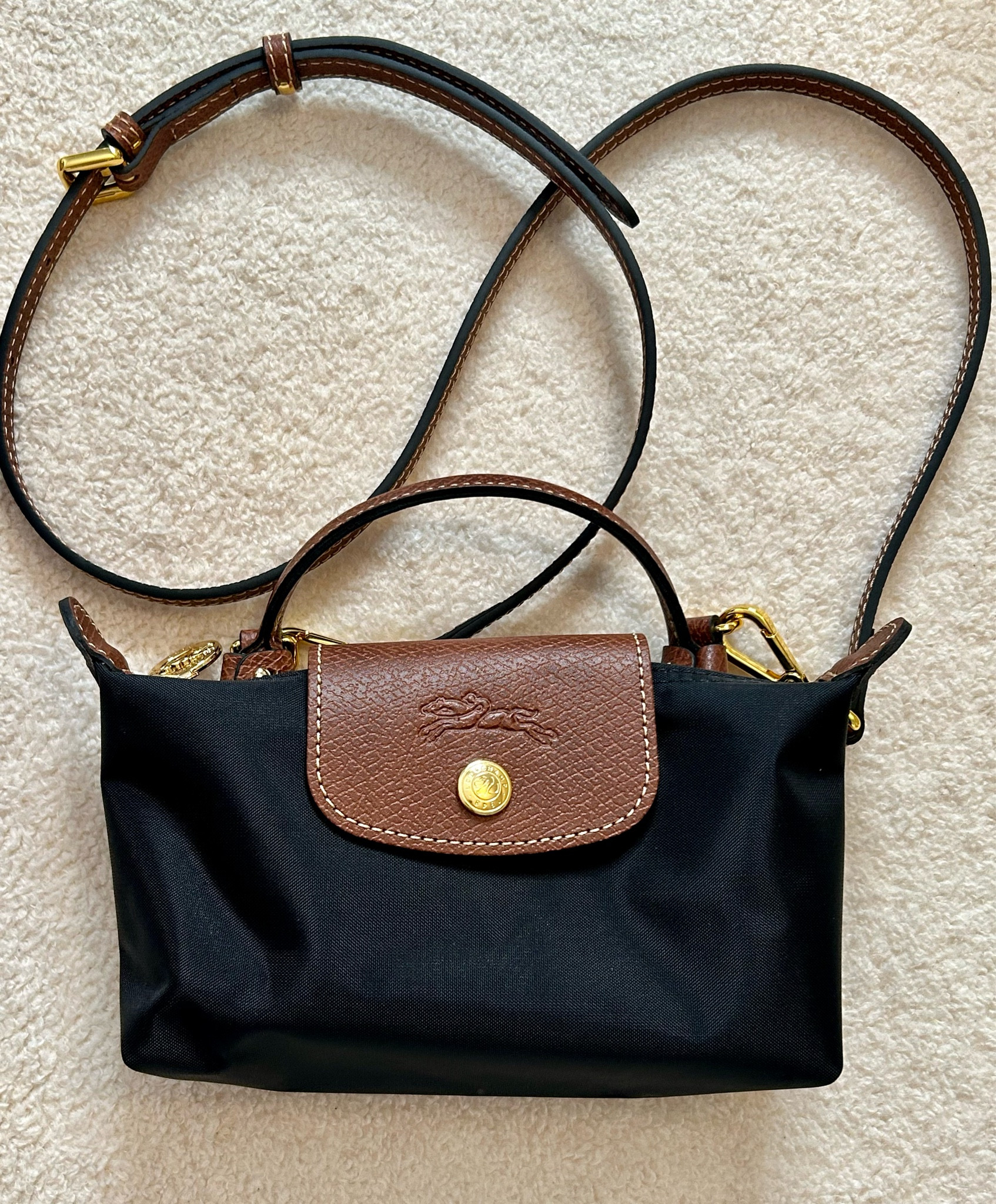 Longchamp pouch 
Add-on strap

#LTKstyletip #LTKover40 #LTKitbag