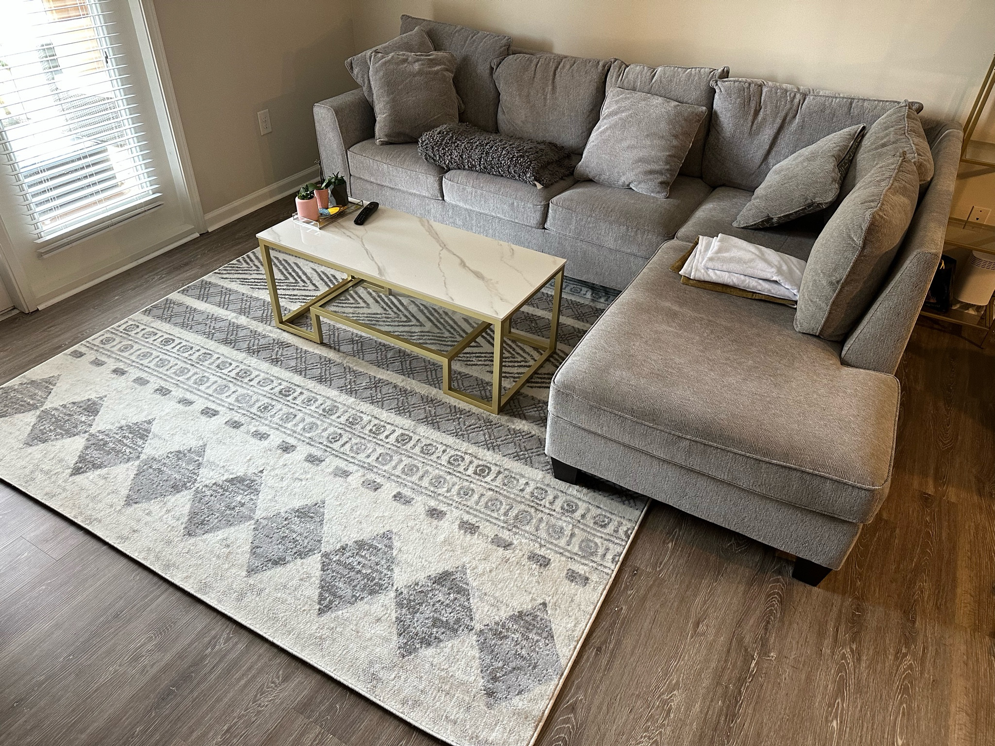Grey and white soft rug for living room // jute rug // modern rug // argyle rug // patterned grey rug // living room inspo 

#LTKunder100 #LTKhome #LTKFind