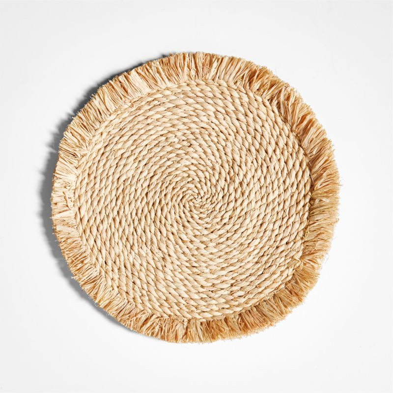Obumu Braided Raffia Round Placemat with Fringe + Reviews | Crate & Barrel | Crate & Barrel