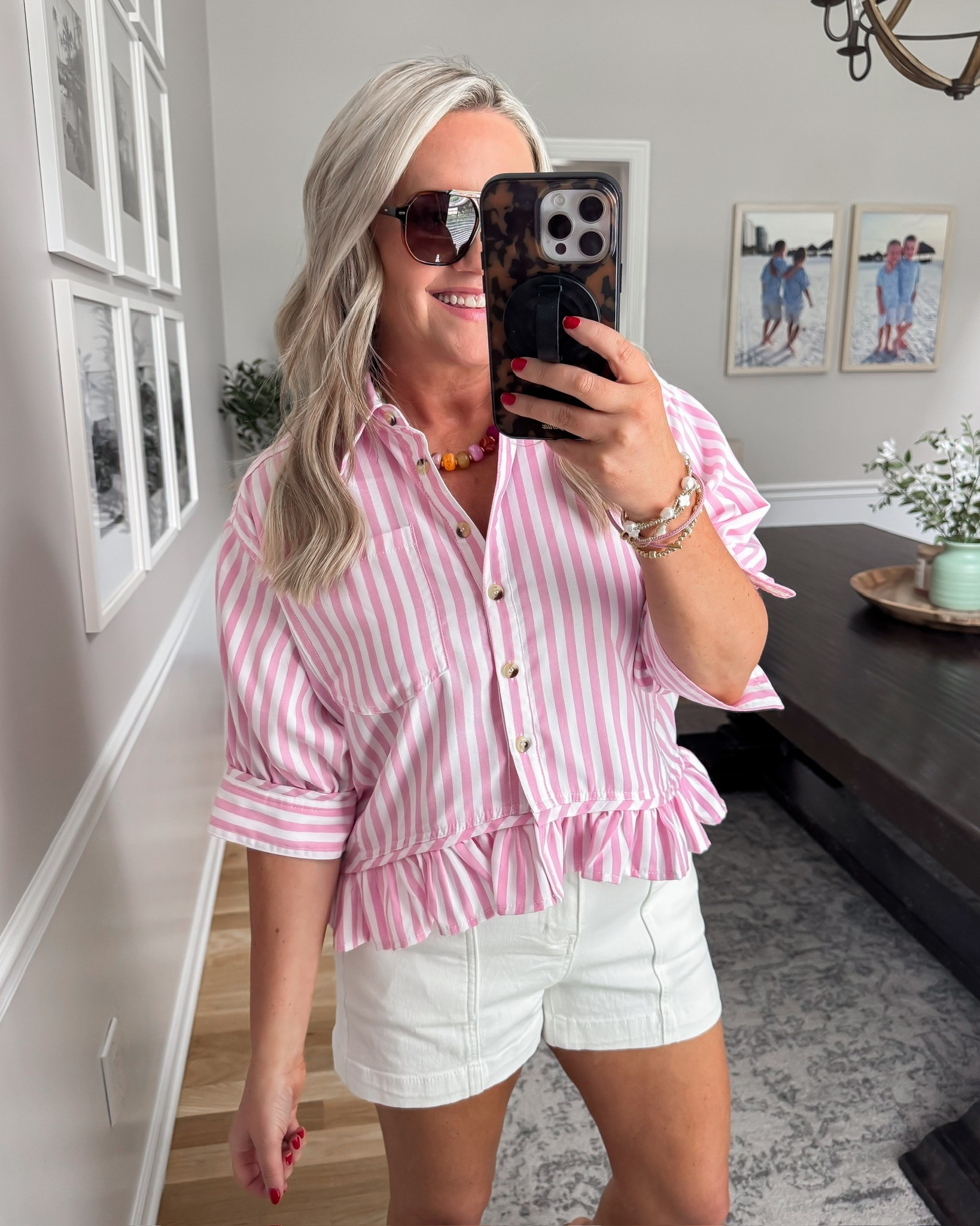 This pink striped top is such a fun statement piece for summer. The ruffle hem and bright color paired with white shorts give it that effortless boutique look that works for brunch, vacations, or everyday plans.

pink striped top, white shorts outfit, summer fashion, colorful outfit idea, boutique style, casual chic outfit, feminine summer look, vacation outfit, cute everyday style, lovelylifestyling

#LTKSeasonal #LTKootd #LTKOver40