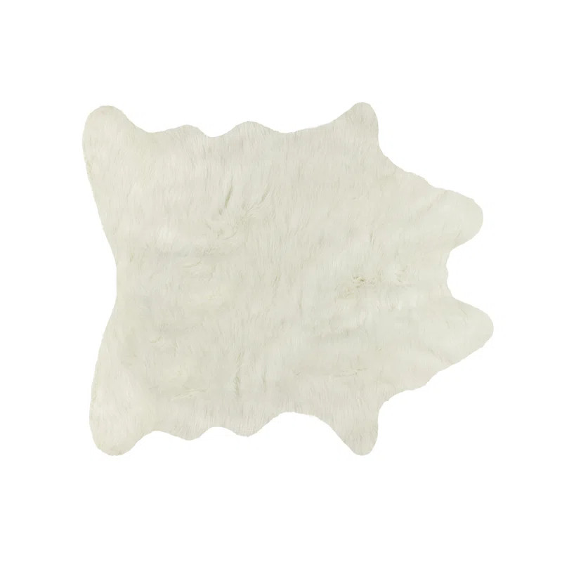 Solid Color Shela Tufted Faux Sheepskin Area Rug in Off White | Wayfair North America